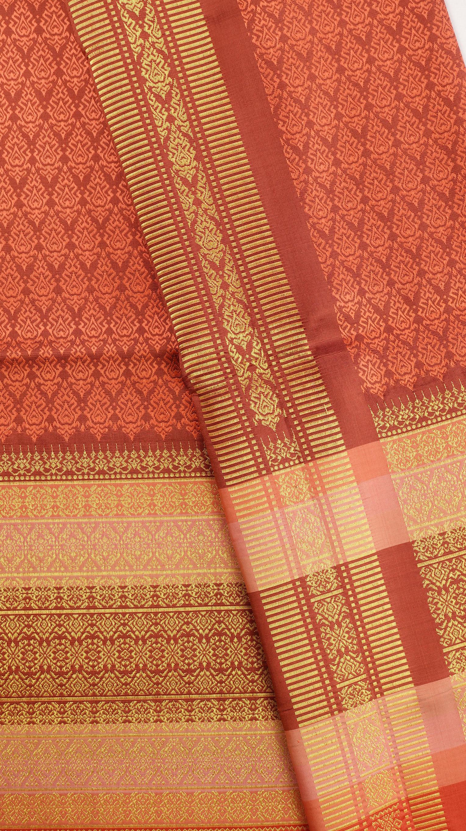 ซิ่น ผ้าไหมยกสุรินทร์ ไหมแท้ ขนาด 1x2เมตร เกาะเชิงดิ้นทอง พื้นสีส้มอิฐ N11-NY-0901673