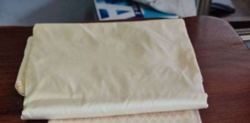 ผ้าไหมสีพื้น เนื้อเรียบ ไหมแท้ 2เส้น สีครีมงาช้าง ราคาต่อหลา รหัส C-119