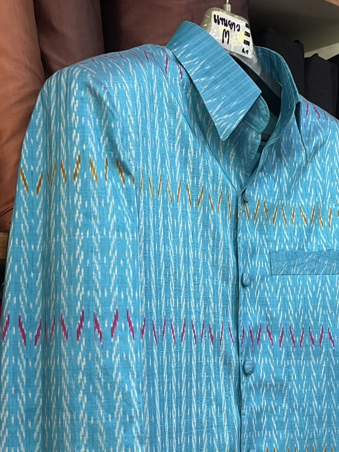 เสื้อผ้าไหม แขนยาว ลายโฮล พื้นสีฟ้า Size M รหัส DR-NY-01246872