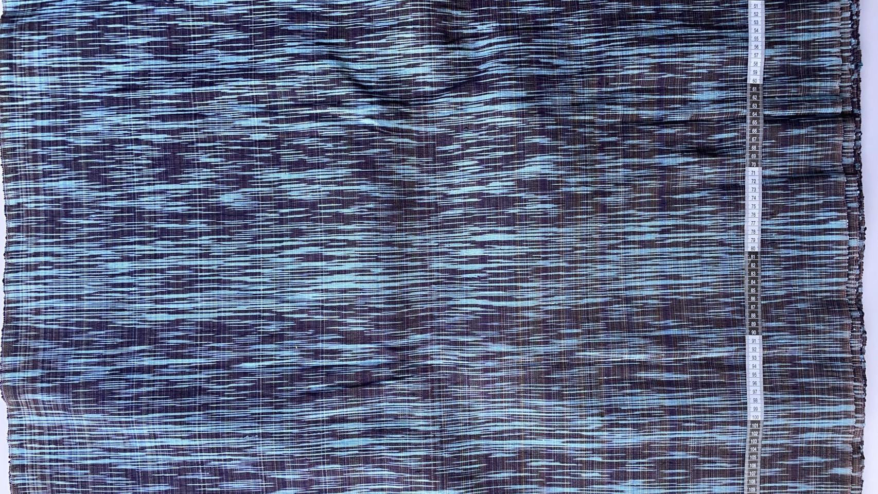 ผ้าไหมลายพิเศษ มัดหมี่เนื้อหนา ไหมแท้ ลายพร่างพรม เครือริ้ว สีน้ำเงิน ตัดขายเป็นเมตร รหัส MMFZ-NY-SKU-39394
