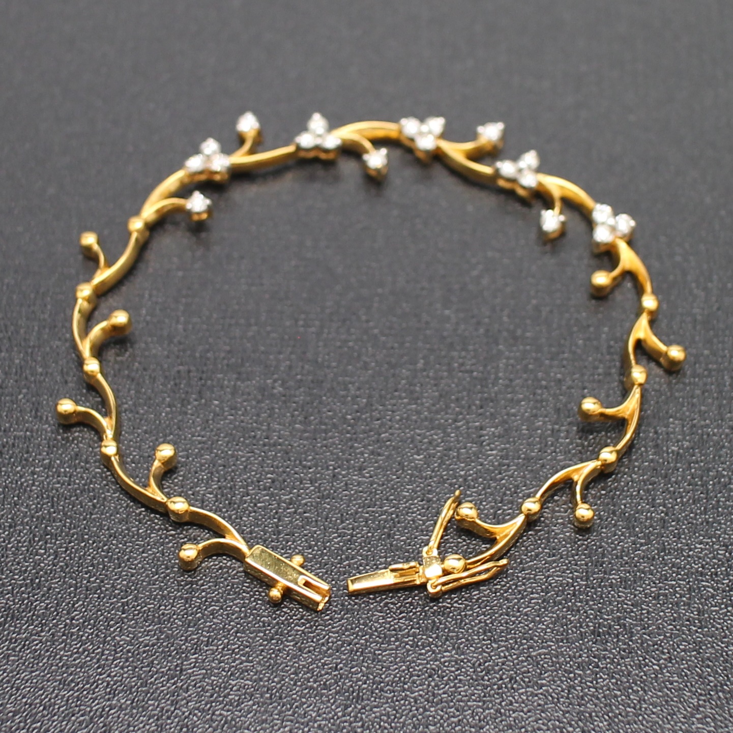 BL25066 สร้อยข้อมือเพชรใบไม้ เพชรแท้ 21 เม็ด 0.80 กะรัต ทองแท้ 90% นน.รวม 10 กรัม ยาว 17 ซม.