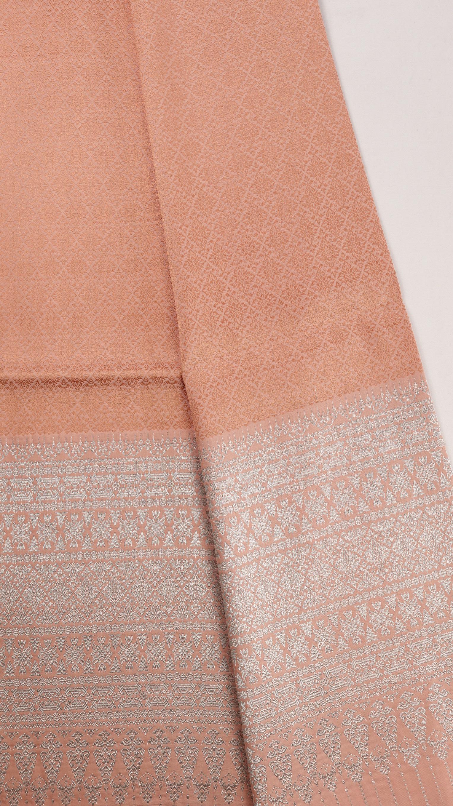 ซิ่น ผ้าไหมยกสุรินทร์ ไหมแท้ ไหมแท้ เกาะเชิงดิ้นเงิน (ไม่มีหน้านาง) ขนาด 1x2เมตร พื้นสีส้มอ่อน N11-NY-0901677