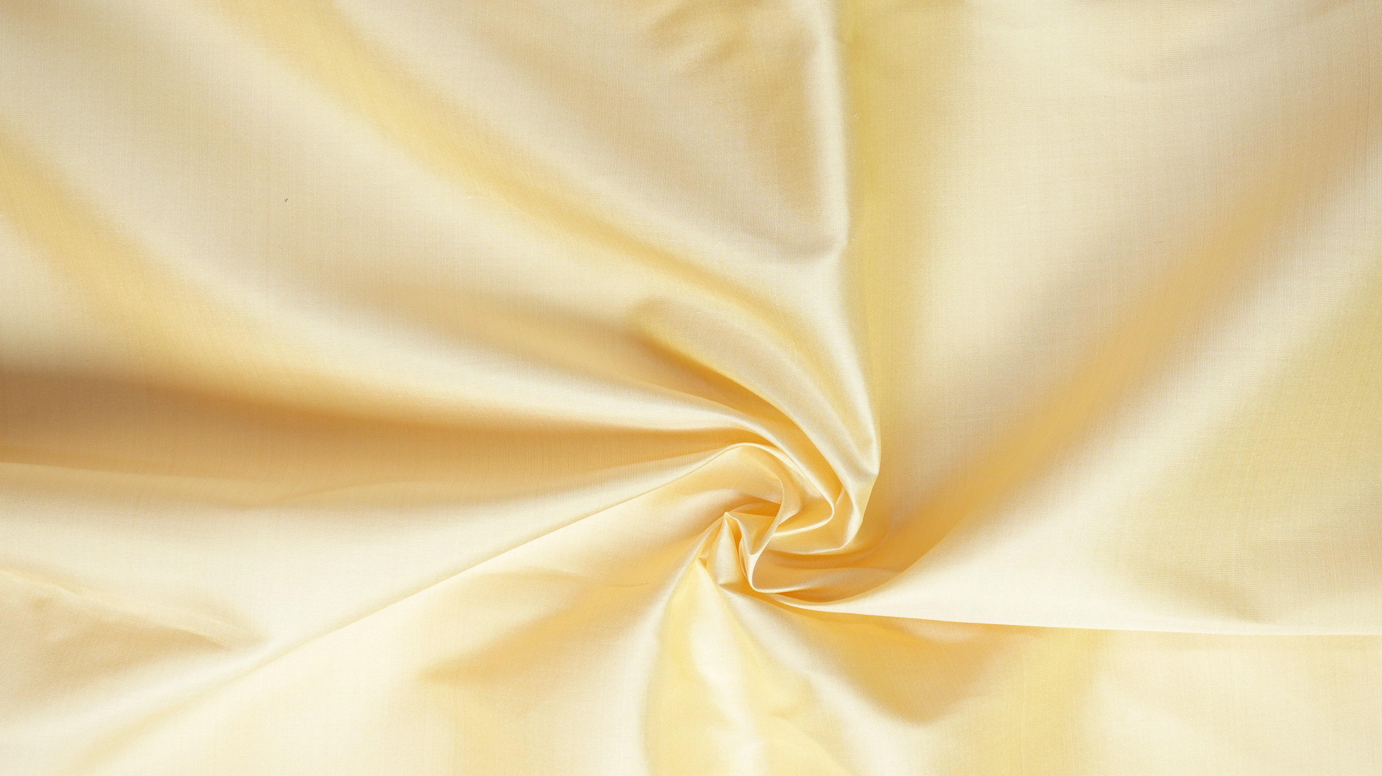 ผ้าไหมสีพื้น เนื้อเรียบ ไหมแท้ 2เส้น ตรานกยูง สีทองนวลเปลือกไข่ (ราคาต่อหลา) รหัส C-NY-SKU-36546