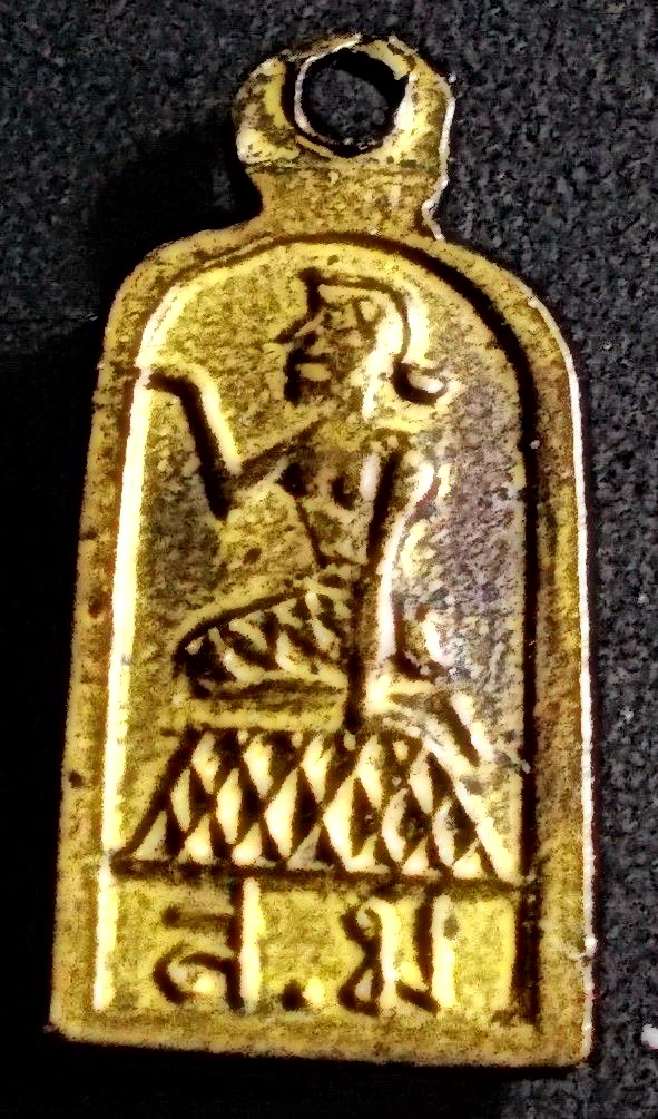 เหรียญใบมะขาม พิมพ์พระพุทธ หลัง นางกวัก หลวงปู่เหมือน วัดกำแพง จ.ชลบุรี ปี 2501