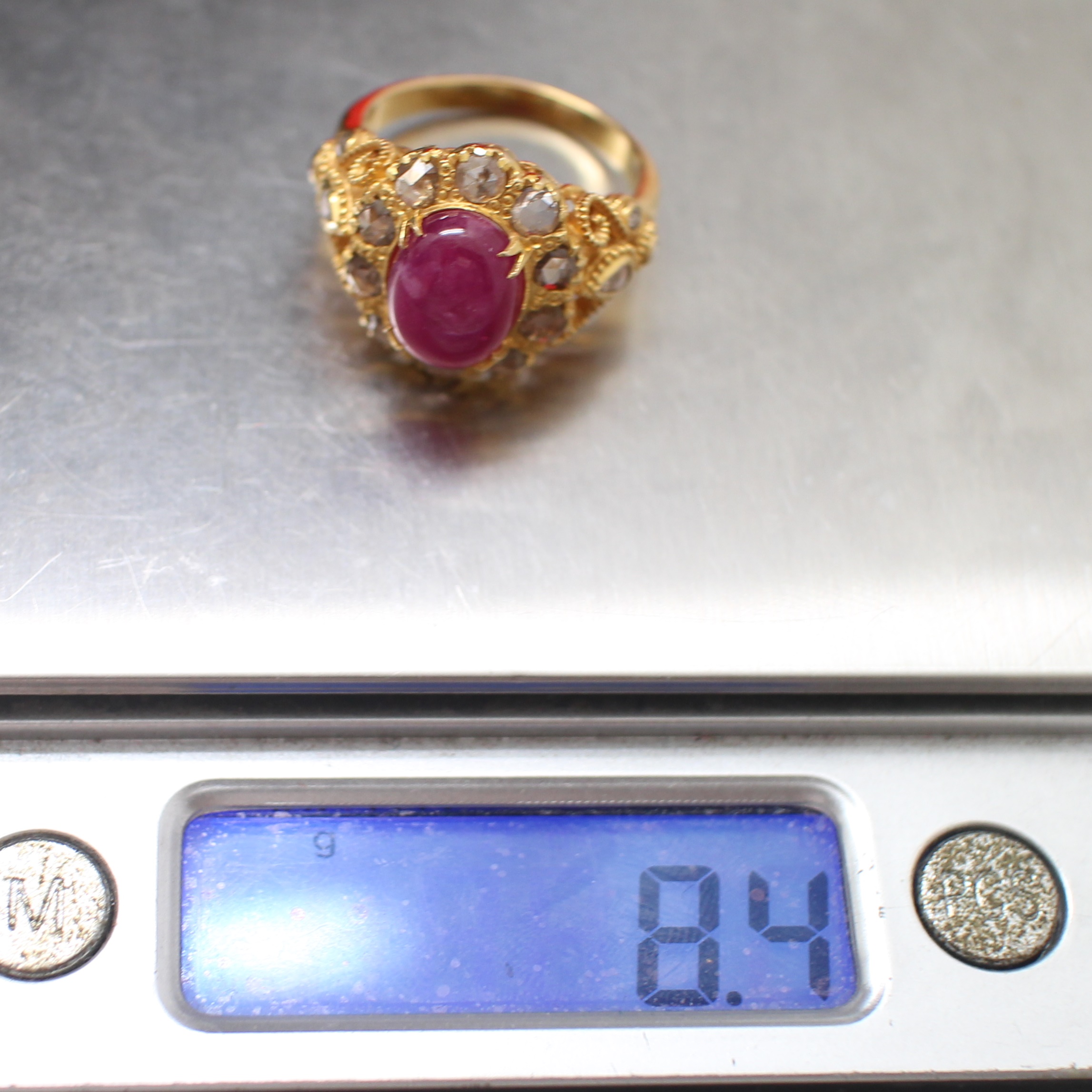 RG250195 แหวนทับทิมล้อมเพชรซีกลูกโลก ทองแท้ 90% นน.รวม 8.4 กรัม ขนาดแหวน 60