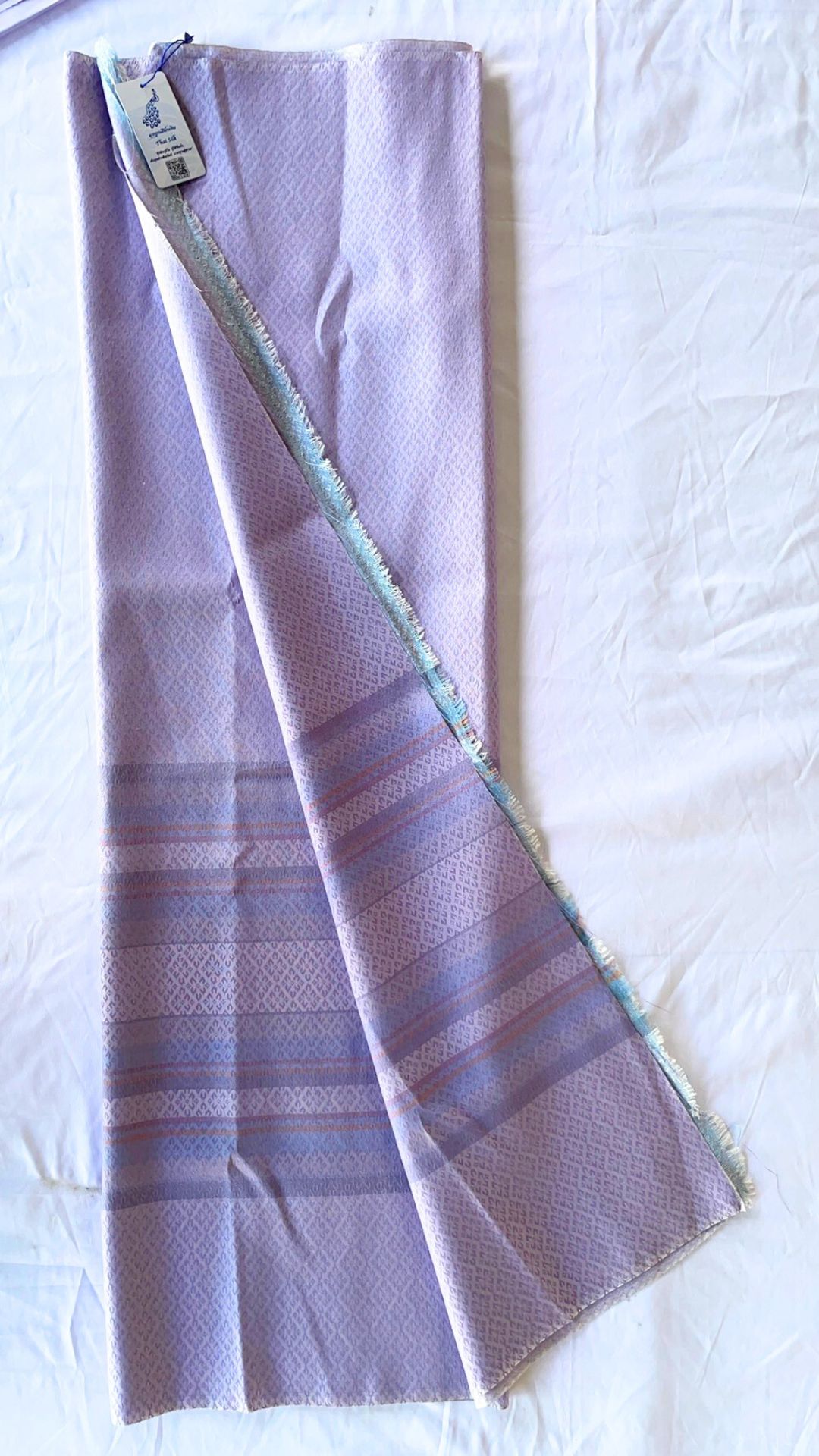 ซิ่น ผ้าไหม ยกดอกมีเชิง ผ้าไหมแท้ ขนาด 1x2หลา สีม่วงเทาอ่อน รหัส B7-NY1012681