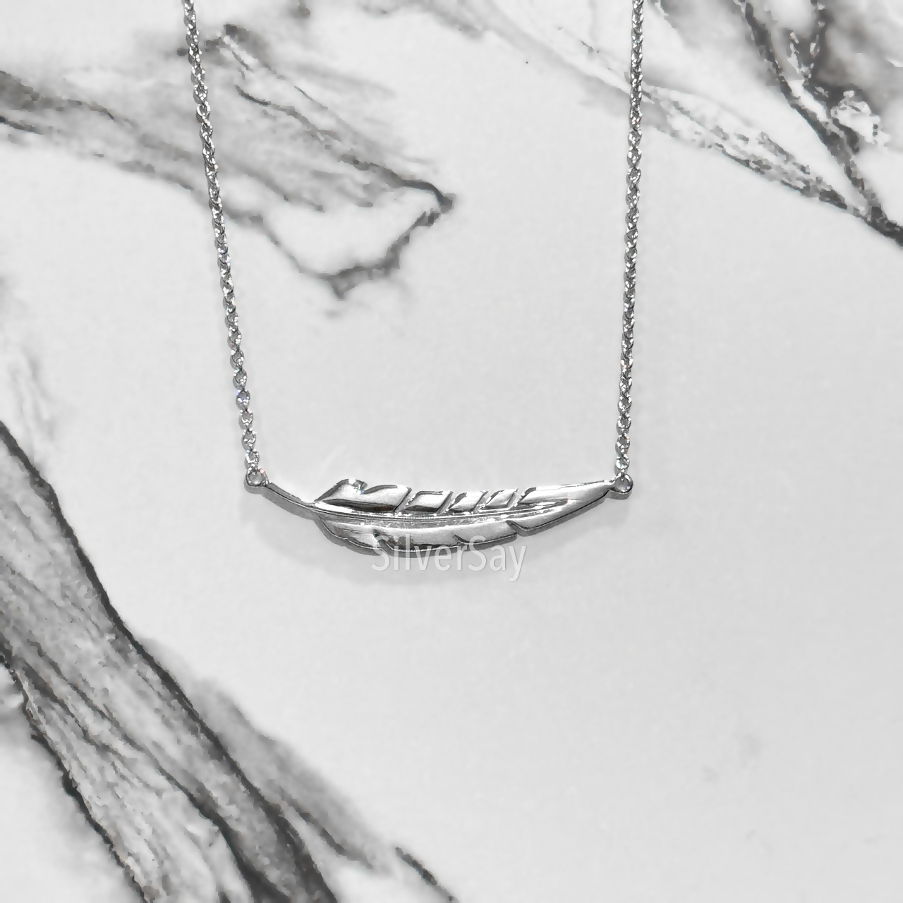 สร้อยคอพร้อมจี้ขนนก Feather necklace