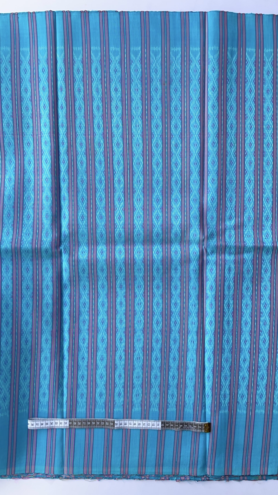 ผ้าไหมมัดหมี่ เนื้อไหมบ้าน ไหมแท้ ลายโฮลคั่นโคมเจ็ด สีฟ้า ตัดขายเป็นเมตร รหัส CISP-NY-SKU-44172