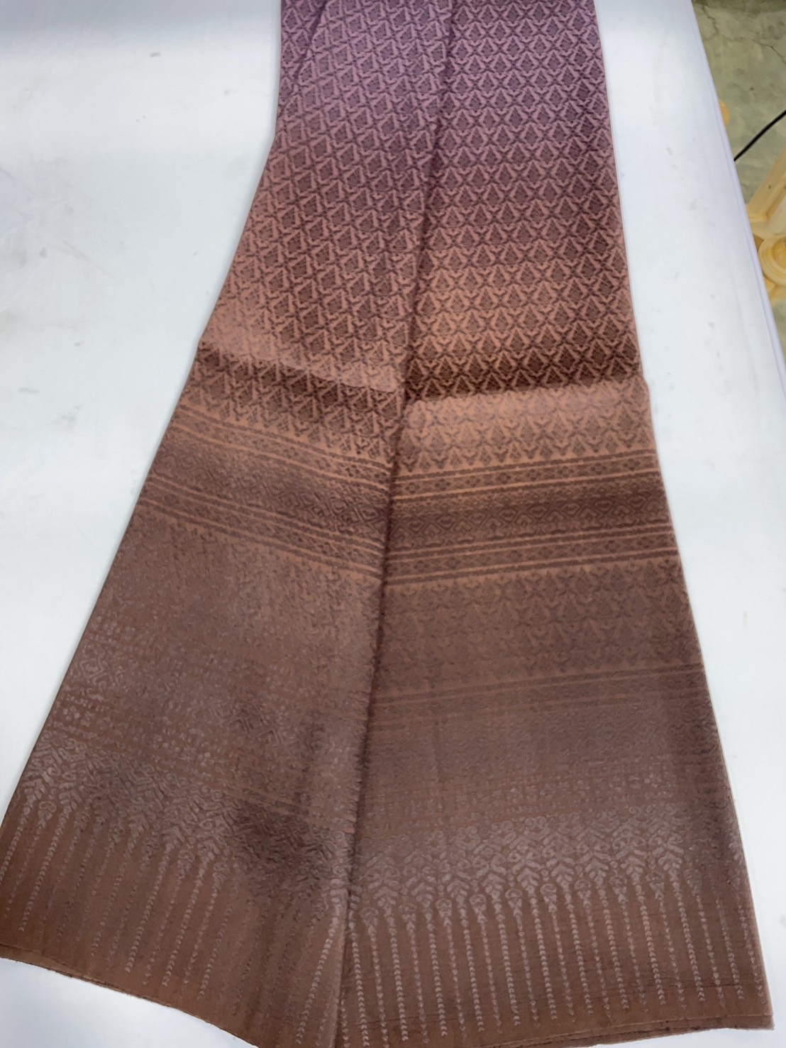ซิ่น ผ้าไหมยกดอกสุรินทร์ 32ตะกอ ขนาด 1x2เมตร ลายเทพพนม ย้อมสไลด์สีม่วงเทาเข้ม - สีน้ำตาล รหัส N11-TT-0803684