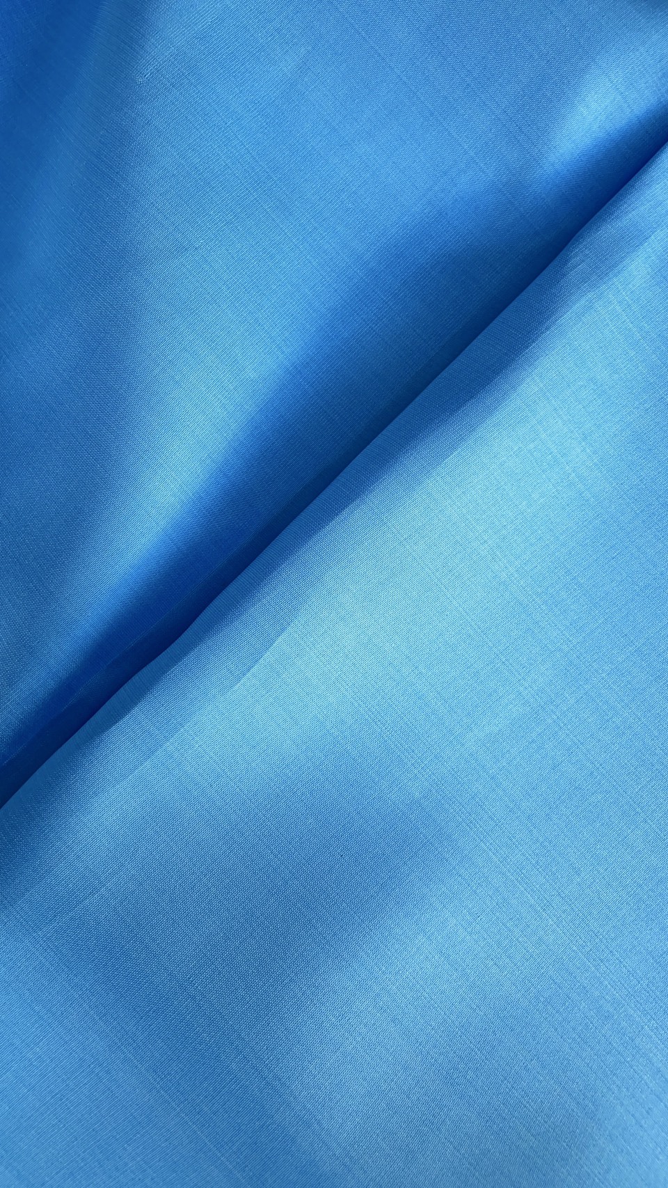 ผ้าไหมสีพื้น เนื้อเรียบ ไหมแท้ 2เส้น ตรานกยูง สีฟ้า (ราคาต่อหลา) รหัส C-NY-0110681