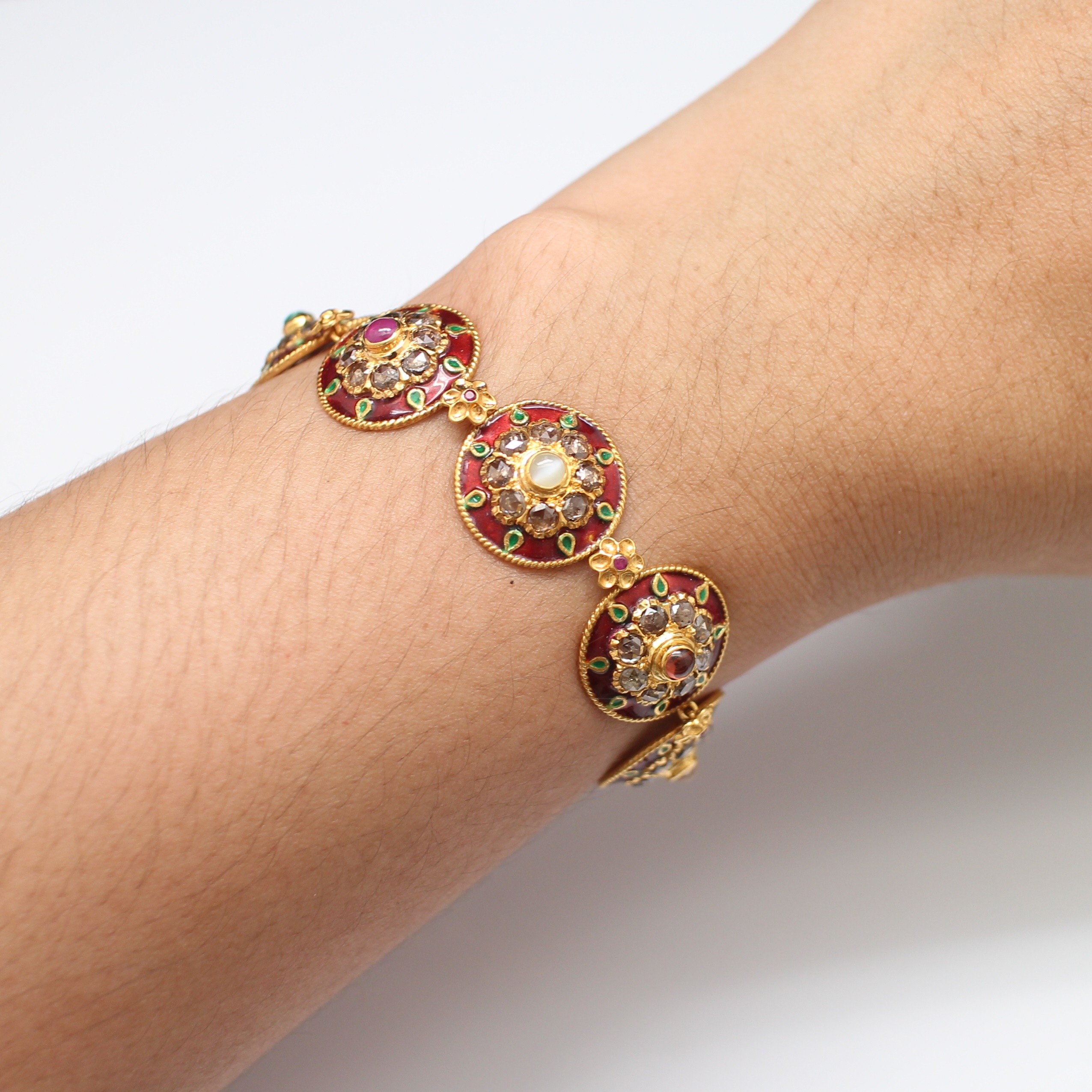 BL25113 สร้อยข้อมือนพเก้าล้อมเพชรซีกทองลงยา ทองแท้ 90% นน.รวม 19 กรัม ยาว 17.5 ซม.