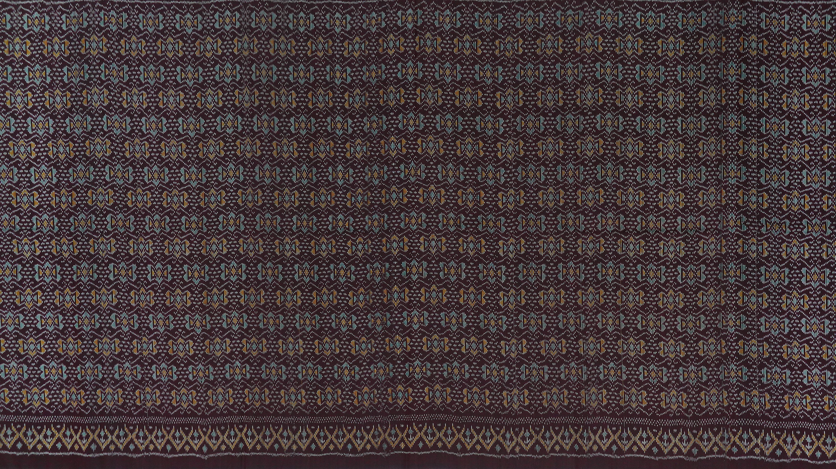 ซิ่น ผ้าไหมมัดหมี่ 3ตะกอ ขนาด 1x2เมตร ลายขอไขว้ พื้นสีม่วงกะปิ รหัส R2Q-ME-066-1220670914