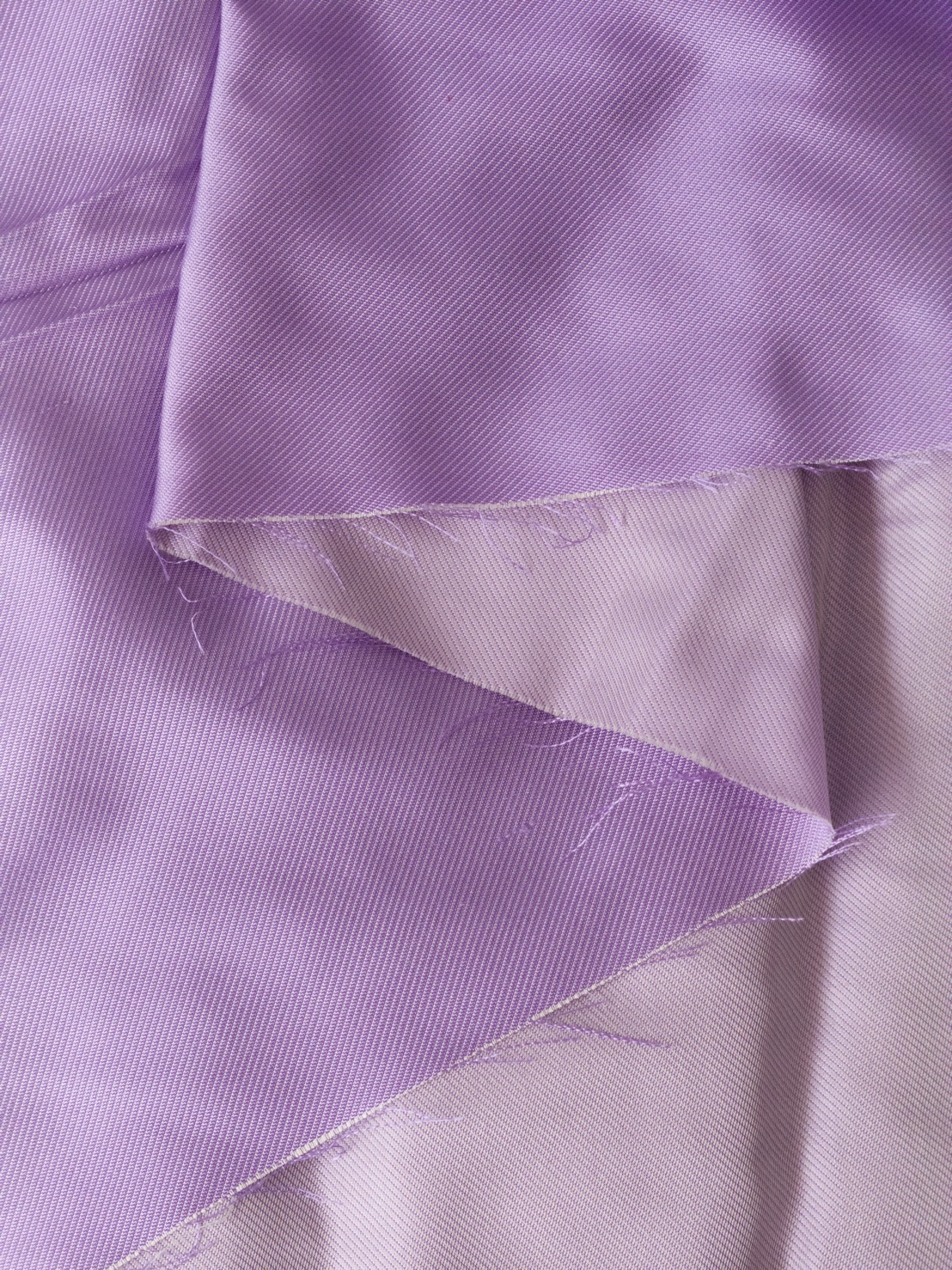 ผ้าไหมยก 4ตะกอ สีพื้นเนื้อลูกฟูก ไหมแท้ สีม่วงดอกมะเขือ (ราคาต่อเมตร) รหัส B-119-1074WA12