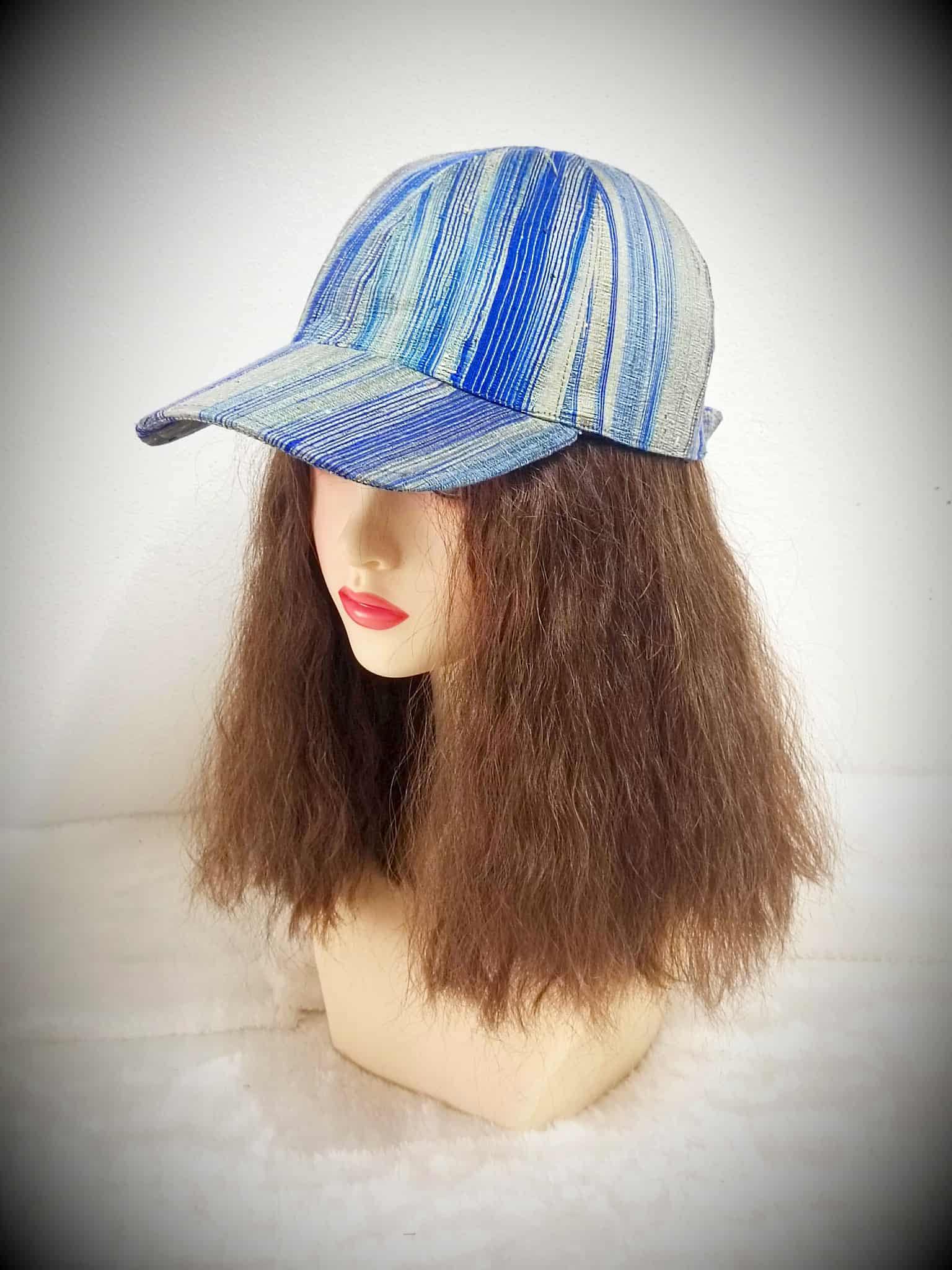 หมวก Cap ไหมแท้ เนื้อไหมลืบมีขี้ไหม ผิวสัมผัสหยาบนุ่ม ปรับไซส์ได้ สีฟ้าขาว รหัส WH-116-HD0912683