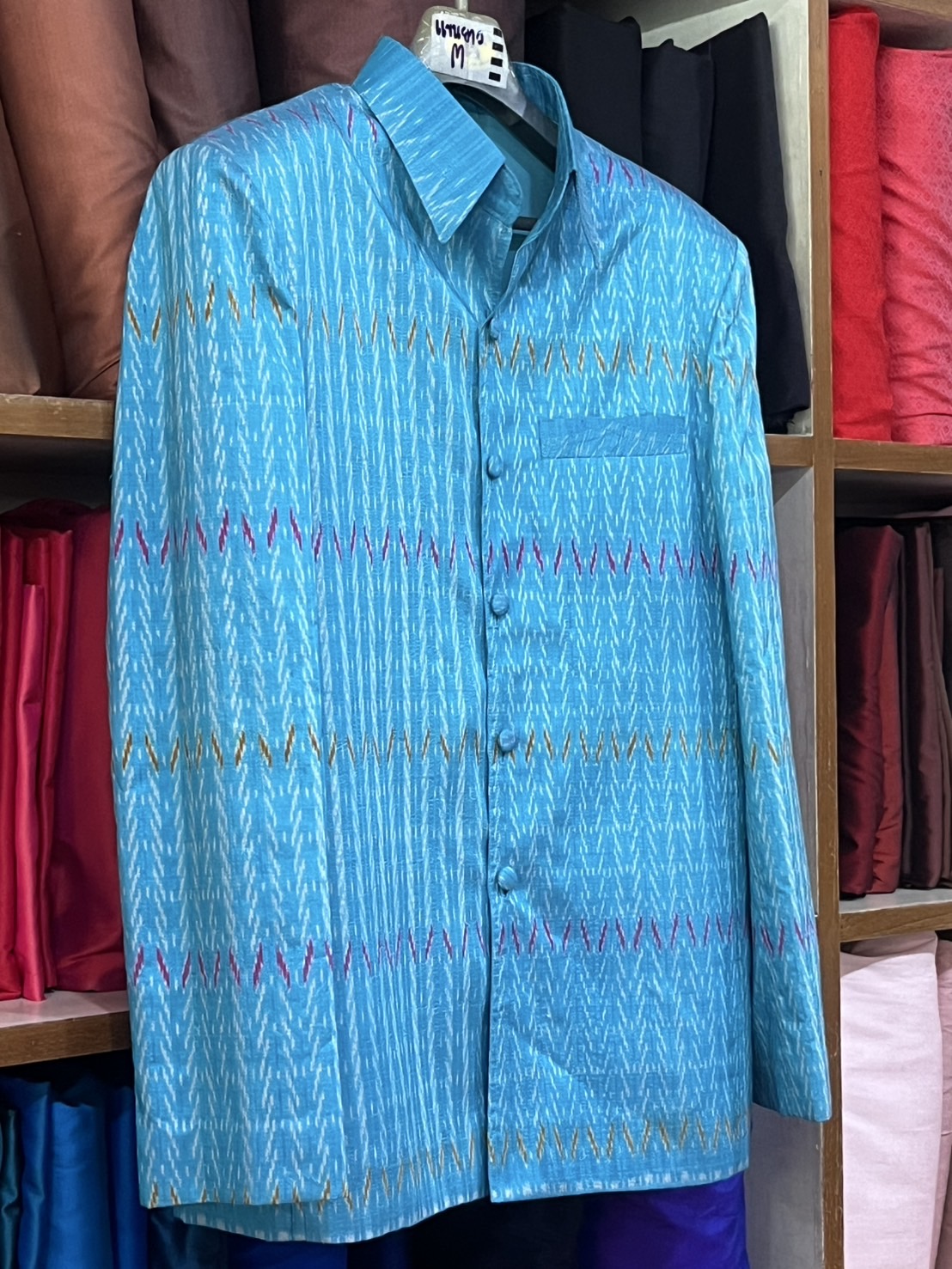 เสื้อผ้าไหม แขนยาว ลายโฮล พื้นสีฟ้า Size M รหัส DR-NY-01246872