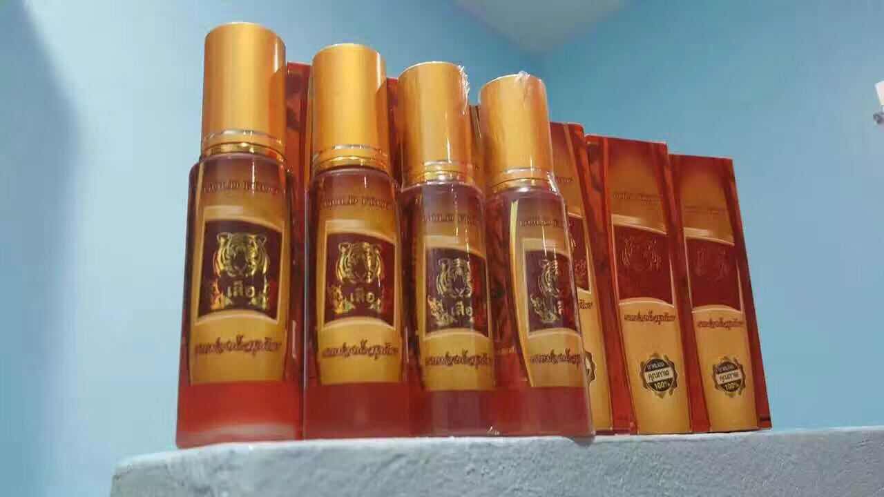 ยาหม่องน้ำสมุนไพรพญาเสือตรา gold frog
