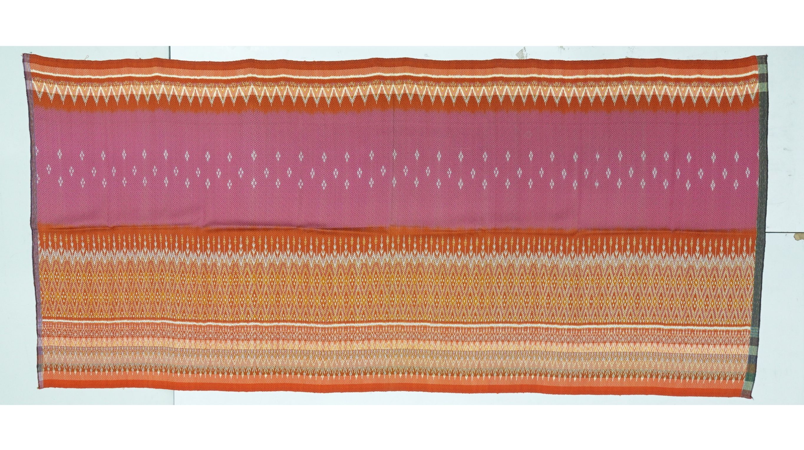 ซิ่น ผ้าไหมมัดหมี่ ทอยกดอก 6ตะกอ ขนาด 1x2เมตร ลายเชิงล่าง พื้นสีส้ม รหัส L9A-ME-066-121967157