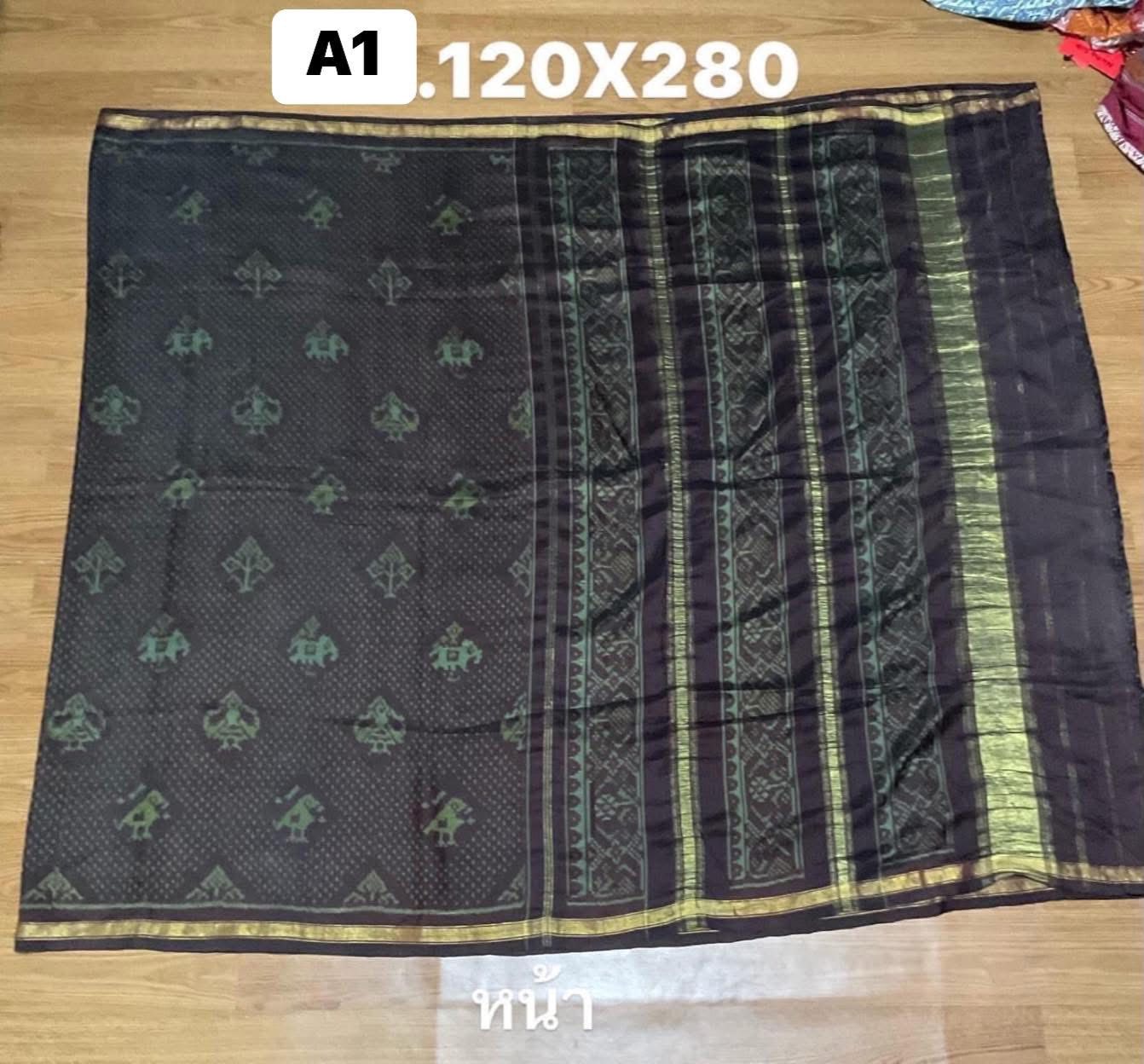 ซิ่น ไหมมัดหมี่ ผ้าปาโตล่า ขนาด 120x280ซม. พื้นสีน้ำตาบอมม่วง มีหน้านาง รหัส N9-SIL-051768A1