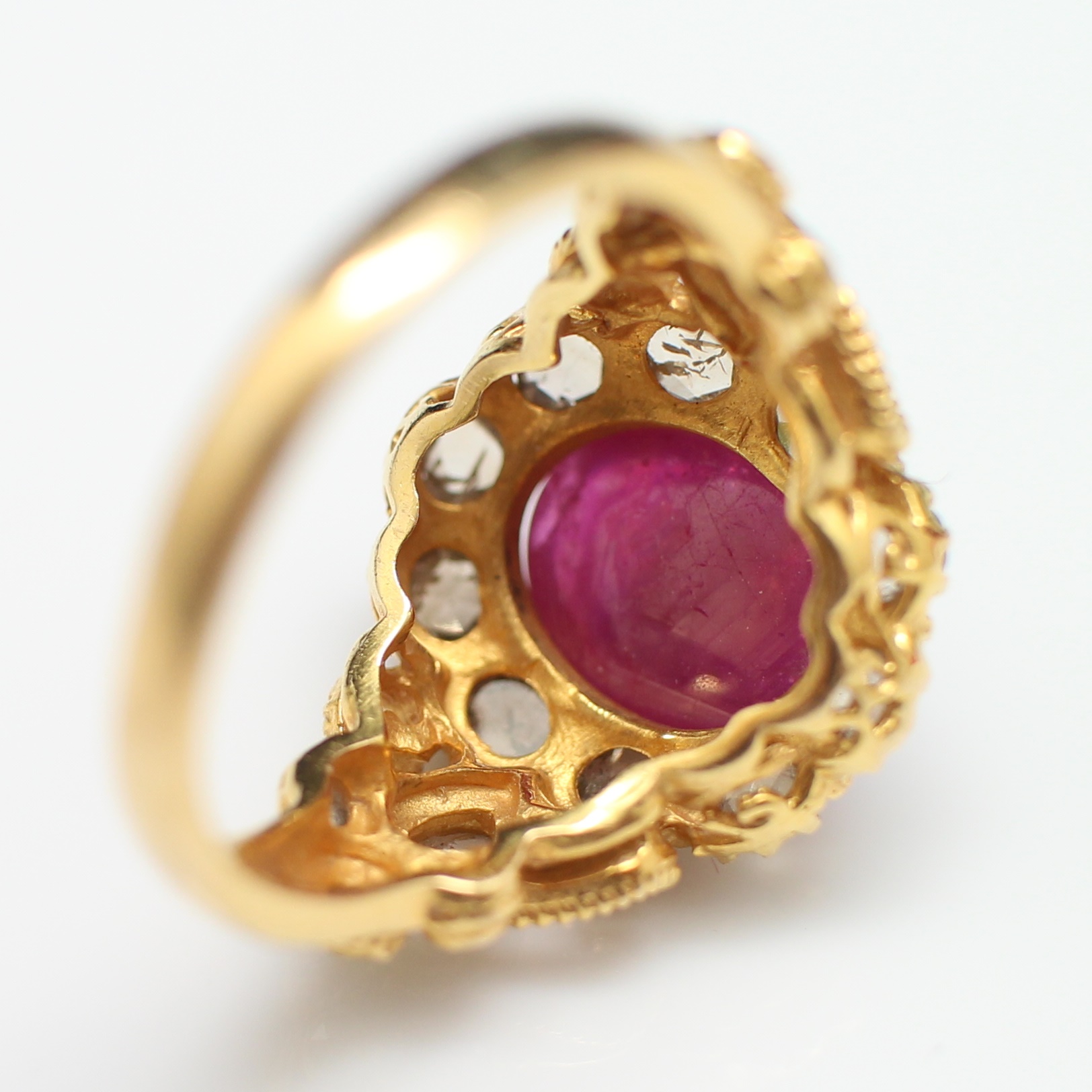 RG250195 แหวนทับทิมล้อมเพชรซีกลูกโลก ทองแท้ 90% นน.รวม 8.4 กรัม ขนาดแหวน 60