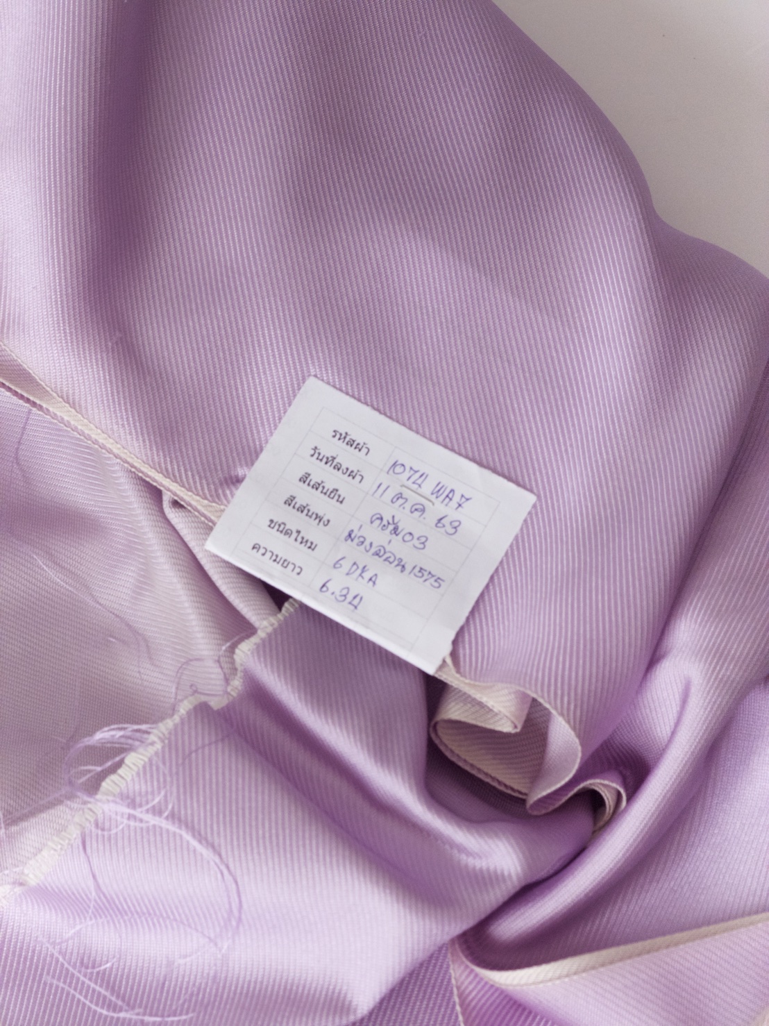 ผ้าไหมยก 4ตะกอ สีพื้นเนื้อลูกฟูก ไหมแท้ สีม่วงอ่อน (ราคาต่อเมตร) รหัส B-119-1074WA7