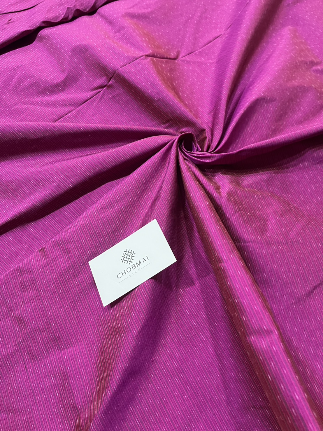 ผ้าไหมมัดหมี่ ไหมแท้ ลายอัมปรม สีชมพูบานเย็น ตัดขายเป็นเมตร รหัส CISP-NY-1024681