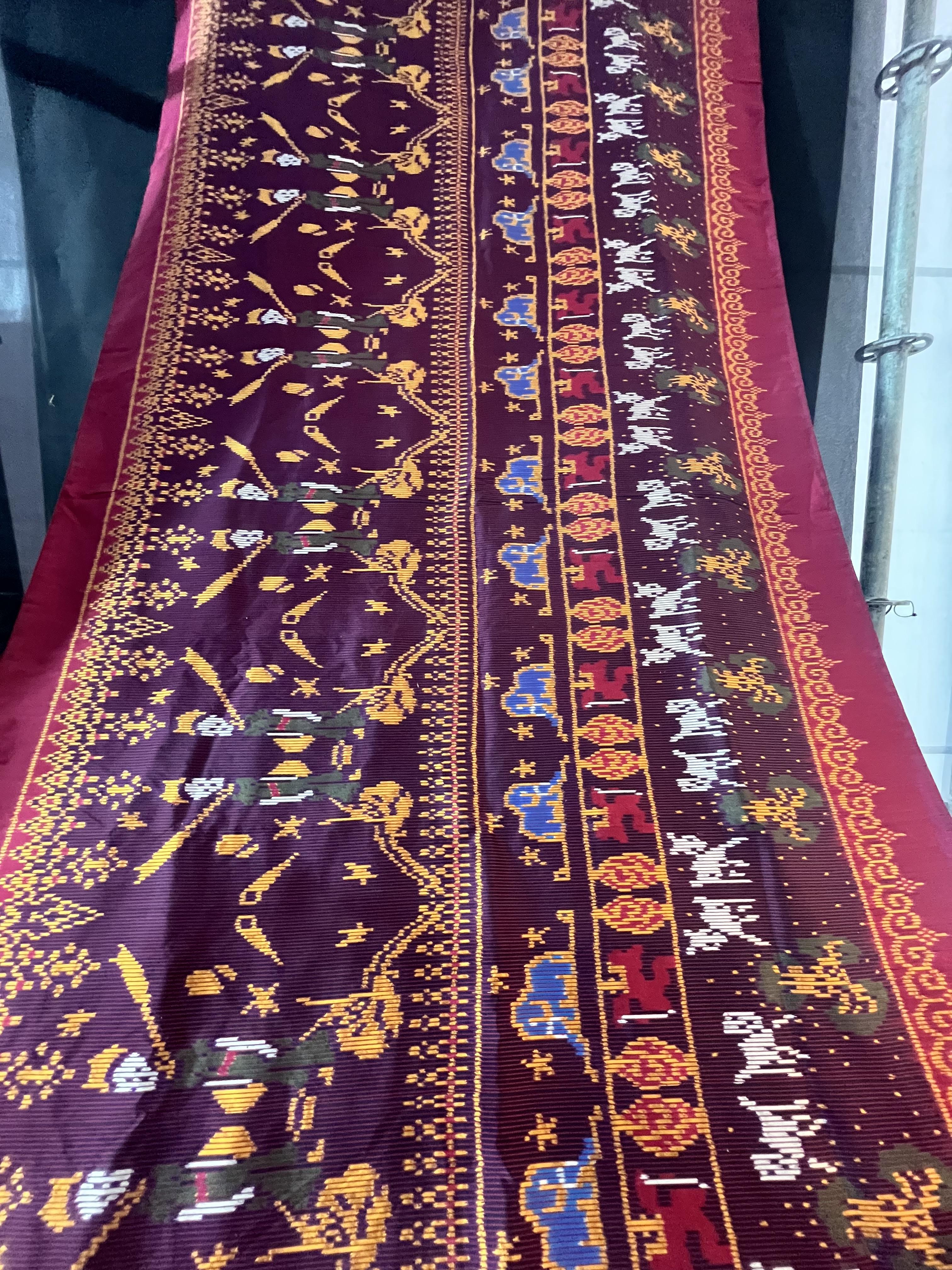 ผ้าไหมมัดหมี่ลายเจ้าชายน้อย ไหมแท้ (Little Prince Ikat Silk Fabric) สีแดง (ตัดขายเป็นเมตร) รหัส M3P-82