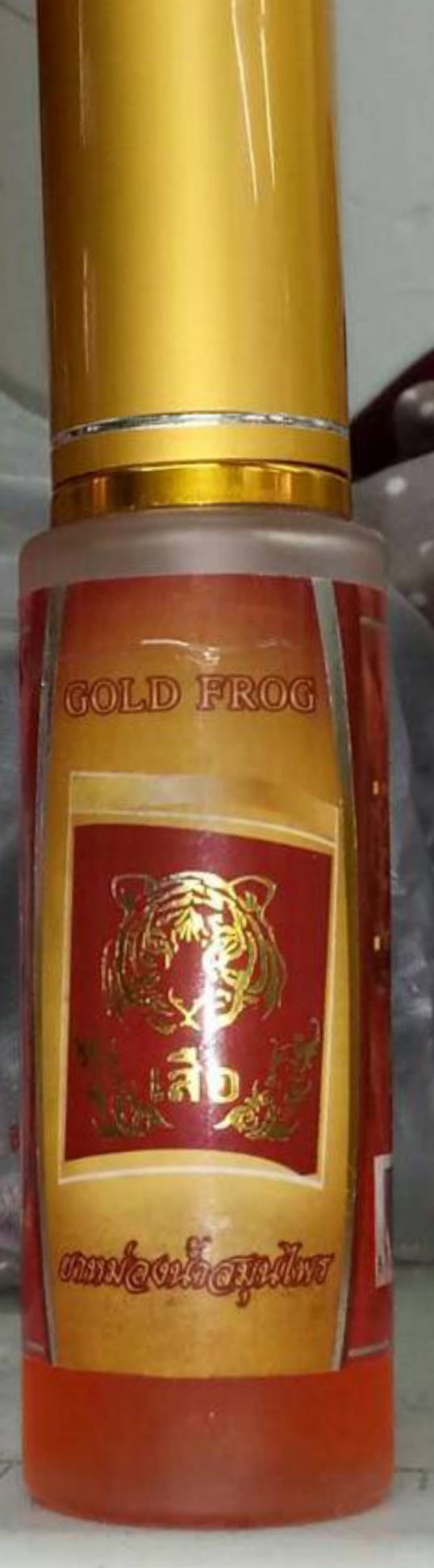 ยาหม่องน้ำสมุนไพรพญาเสือตรา gold frog
