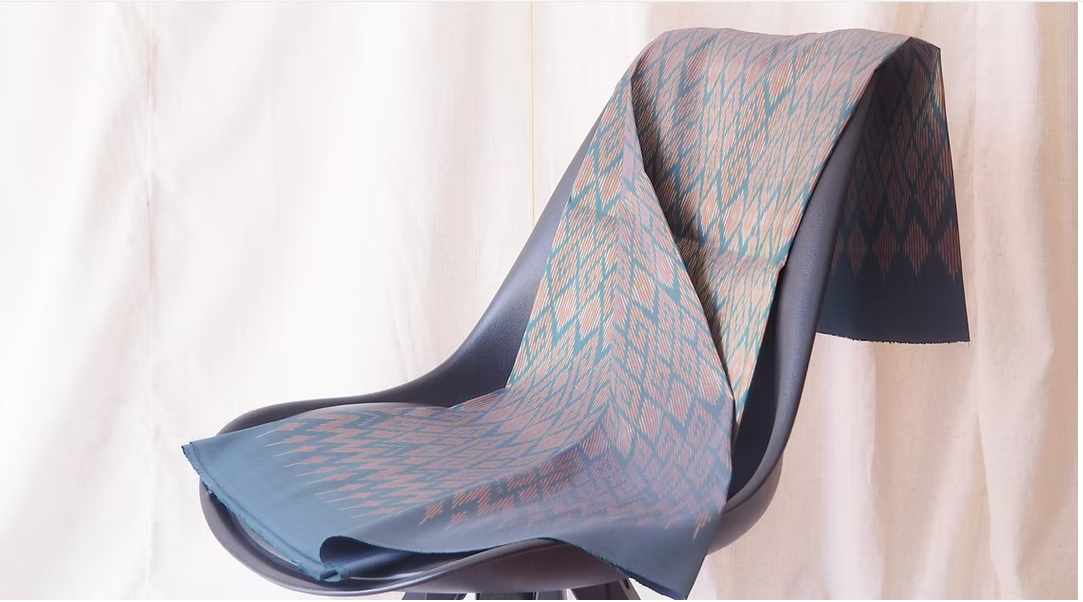 ซิ่น ผ้าไหมมัดหมี่ ไหมบ้าน ขนาด 1x2หลา พื้นสีเขียว รหัส CISP-CT-102474