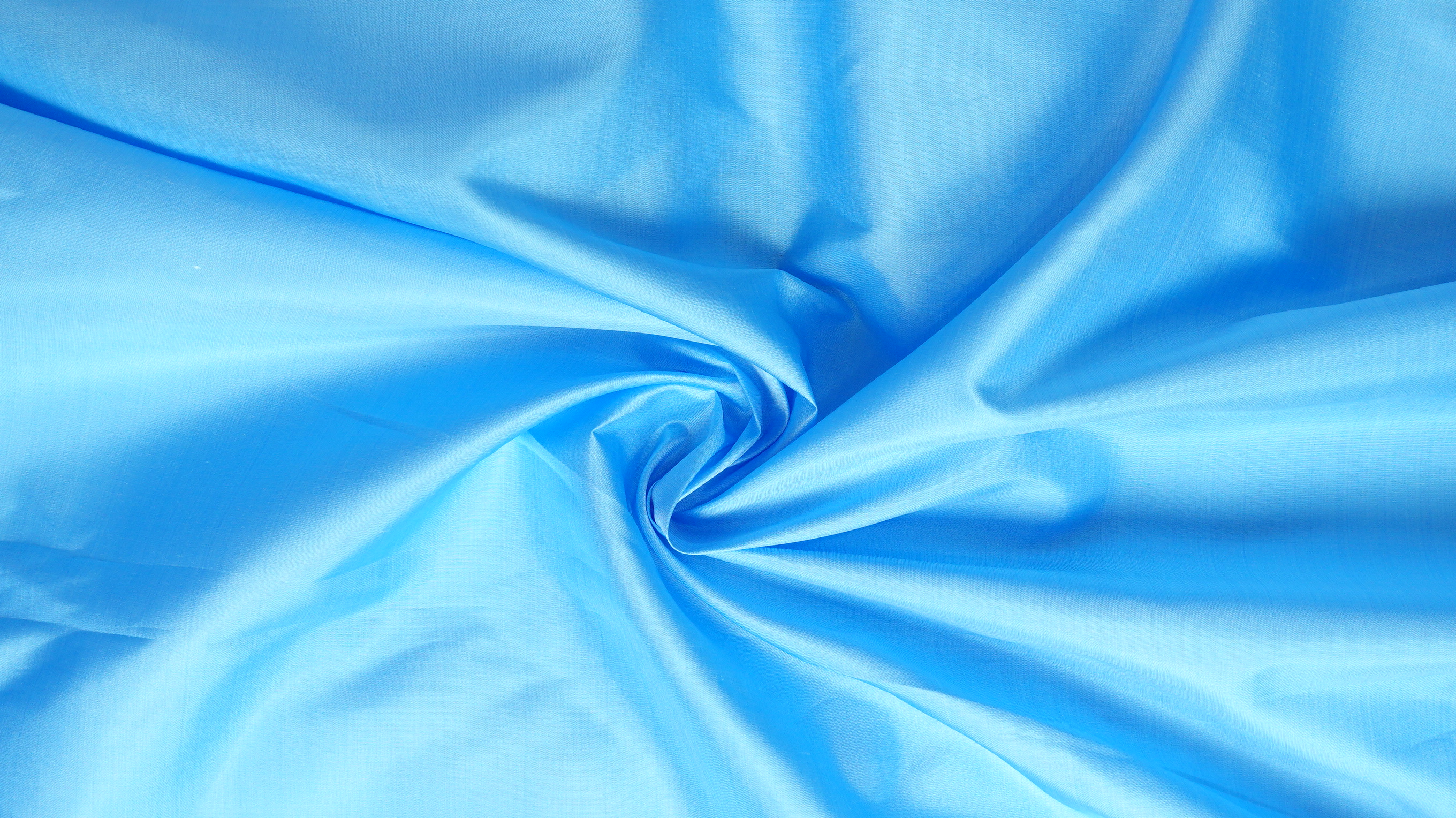 ผ้าไหมสีพื้น เนื้อเรียบ ไหมแท้ 2เส้น ตรานกยูง สีฟ้า (ราคาต่อหลา) รหัส C-NY-SKU-36556