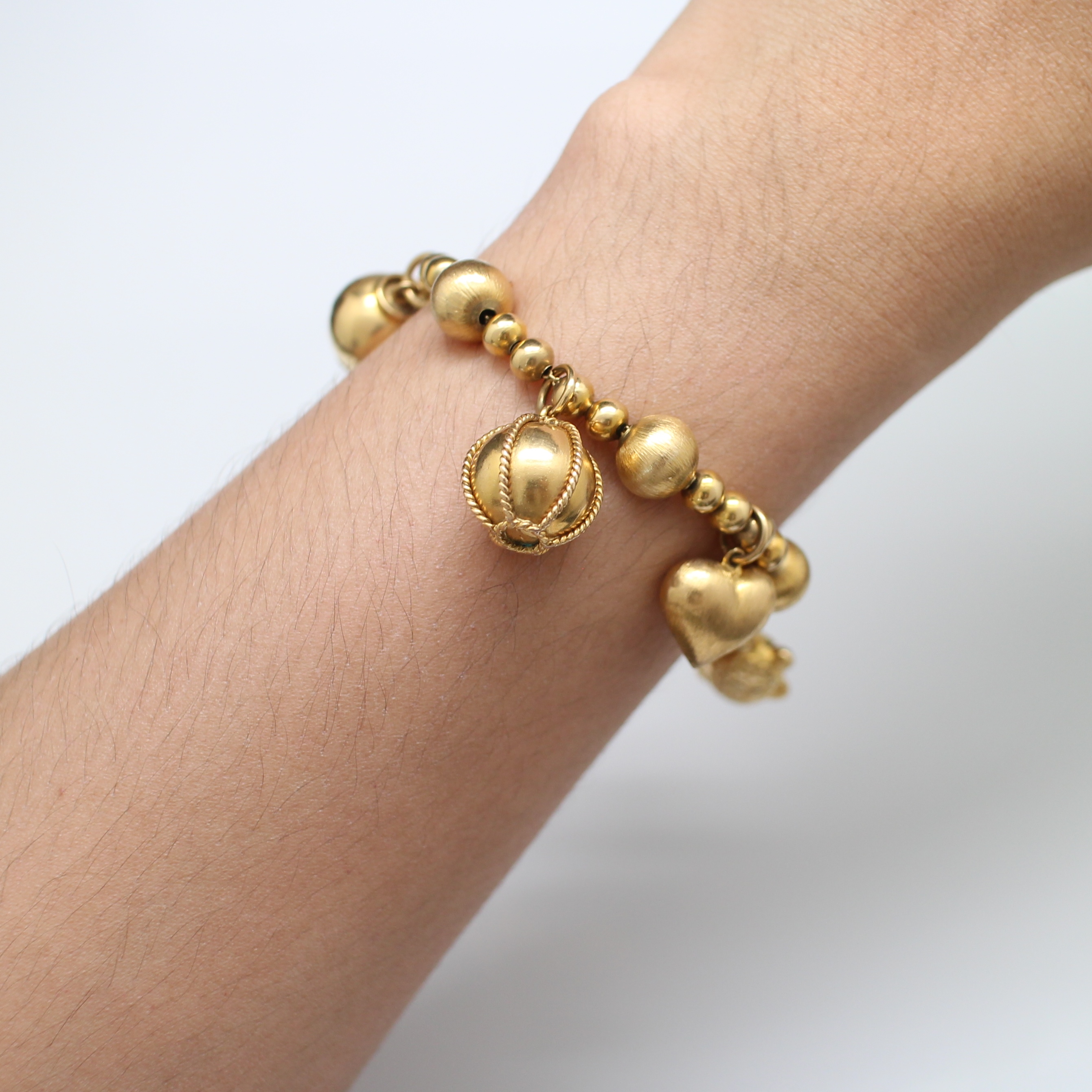 BL25042 สร้อยข้อมือตุ้งติ้ง เต่า หัวใจ หม้อ ทองแท้ 90% นน.รวม 32 กรัม ยาว 17.5 ซม. งานสวย สภาพดี