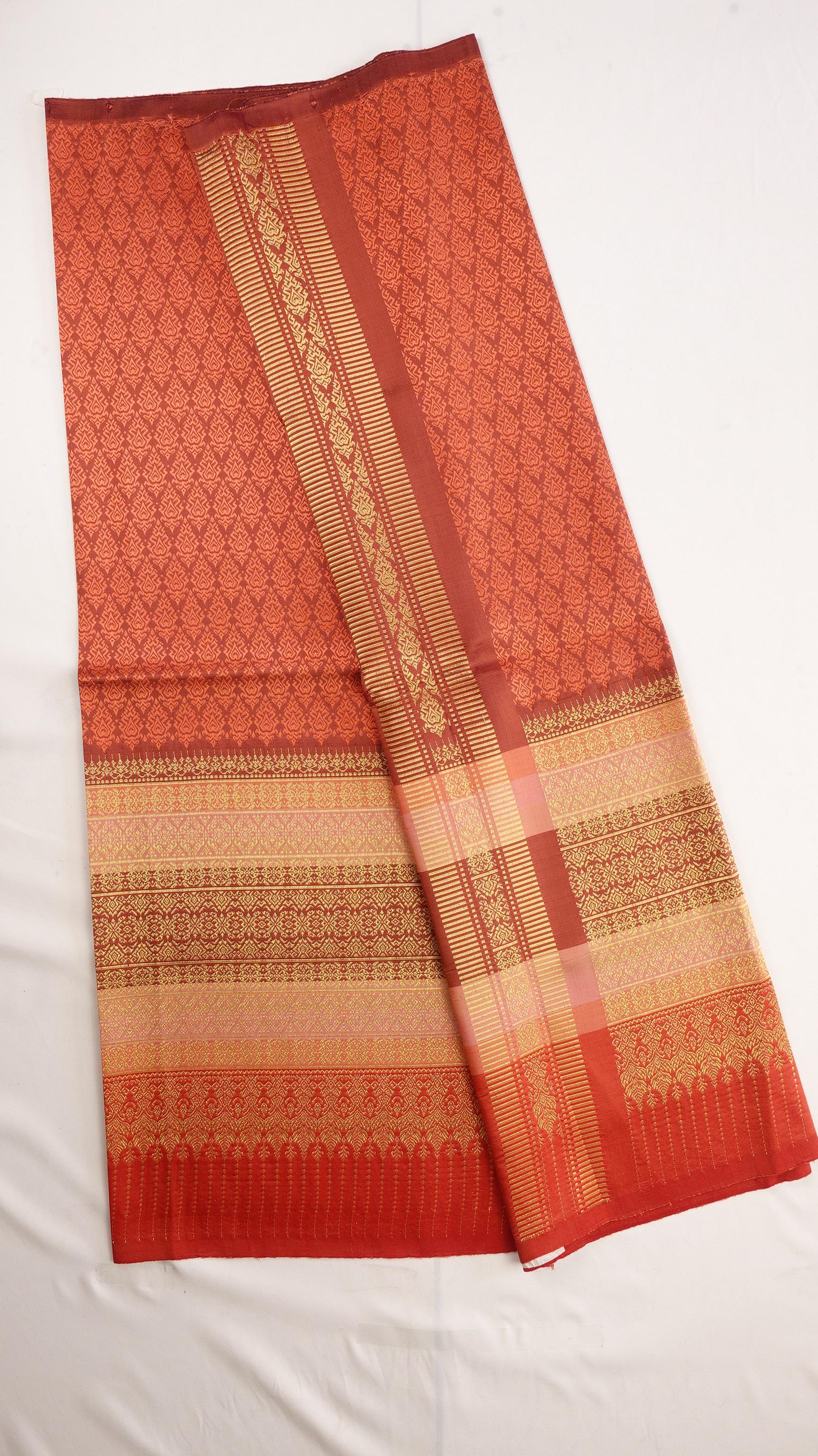 ซิ่น ผ้าไหมยกสุรินทร์ ไหมแท้ ขนาด 1x2เมตร เกาะเชิงดิ้นทอง พื้นสีส้มอิฐ N11-NY-0901673