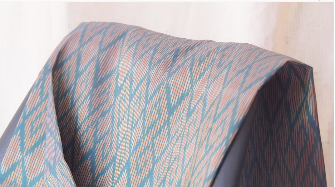 ซิ่น ผ้าไหมมัดหมี่ ไหมบ้าน ขนาด 1x2หลา พื้นสีเขียว รหัส CISP-CT-102474