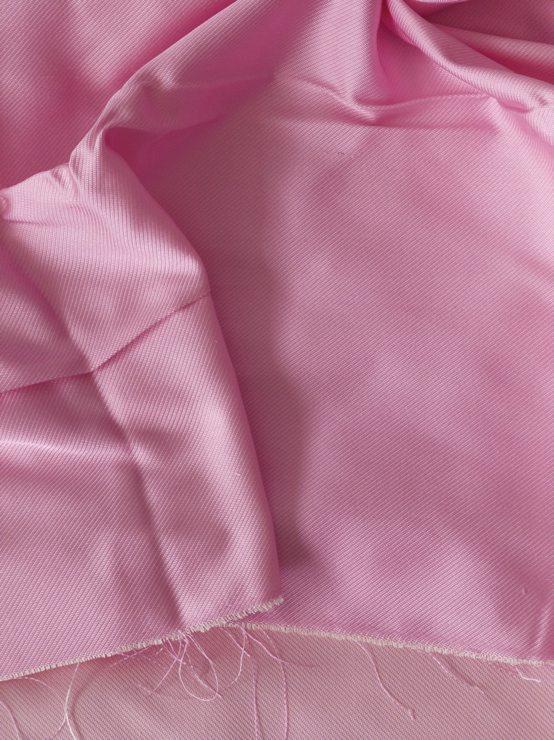 ผ้าไหมยก 4ตะกอ สีพื้นเนื้อลูกฟูก ไหมแท้ สีชมพูกลีบบัว (ราคาต่อเมตร) รหัส B-119-1074WA15