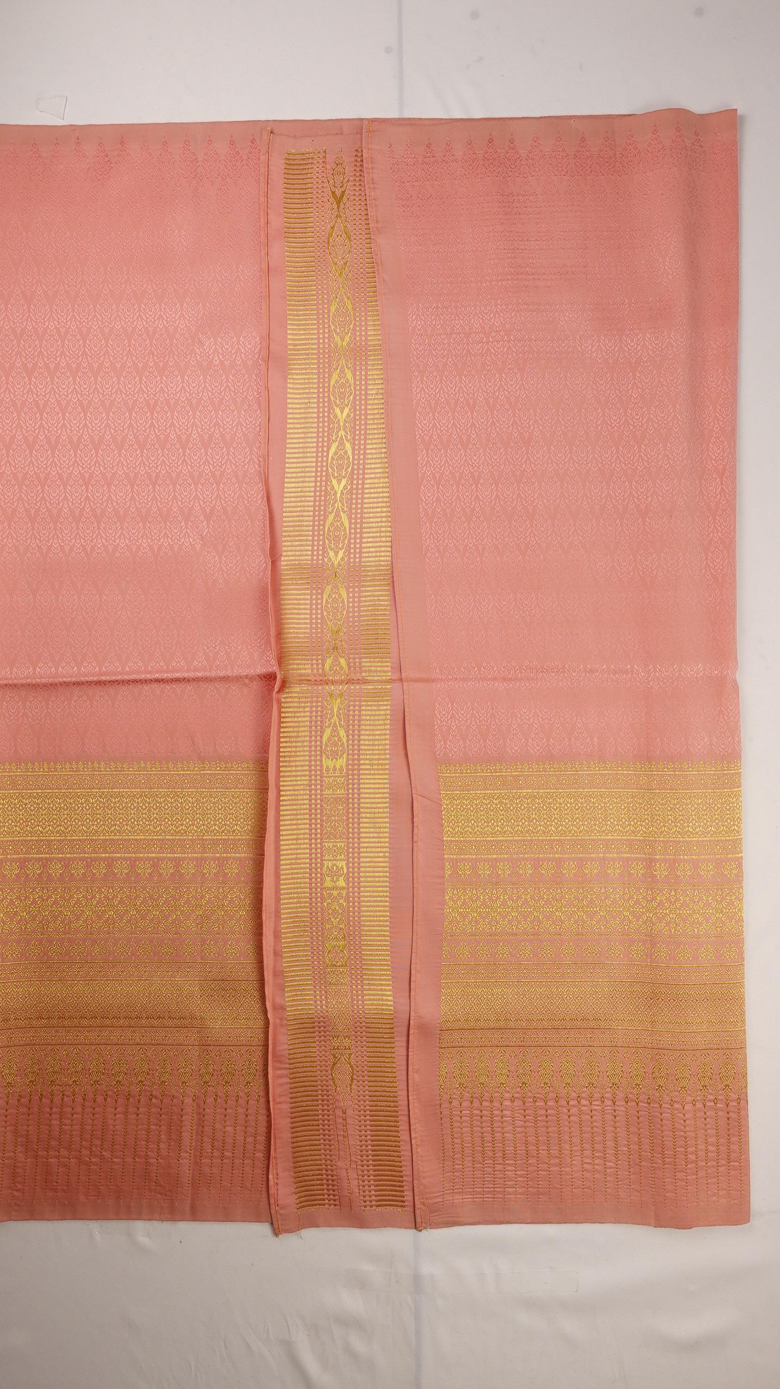 ซิ่น ผ้าไหมยกสุรินทร์ ไหมแท้ เกาะเชิงดิ้นทอง ขนาด 1x2เมตร สีชมพู สีโอรส N11-NY-09016712