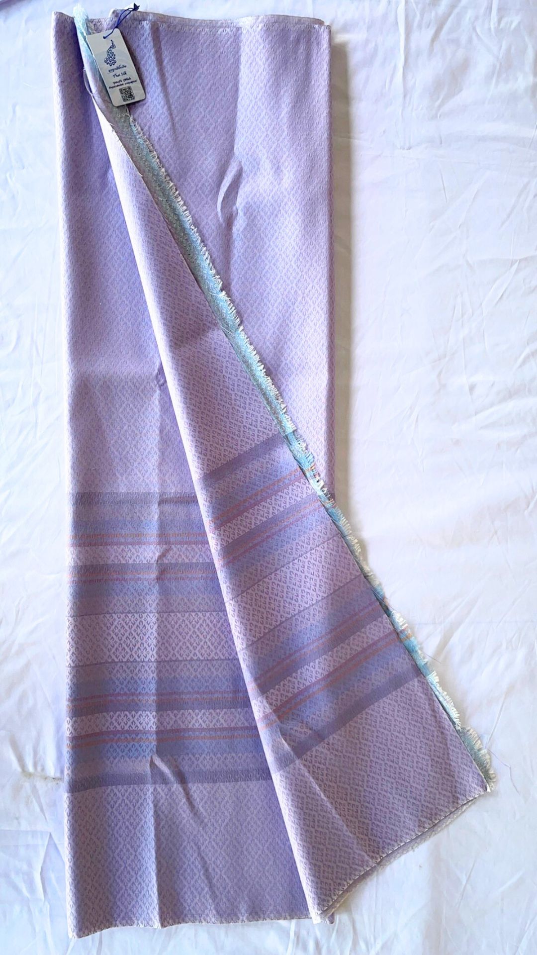 ซิ่น ผ้าไหม ยกดอกมีเชิง ผ้าไหมแท้ ขนาด 1x2หลา สีม่วงเทาอ่อน รหัส B7-NY1012681