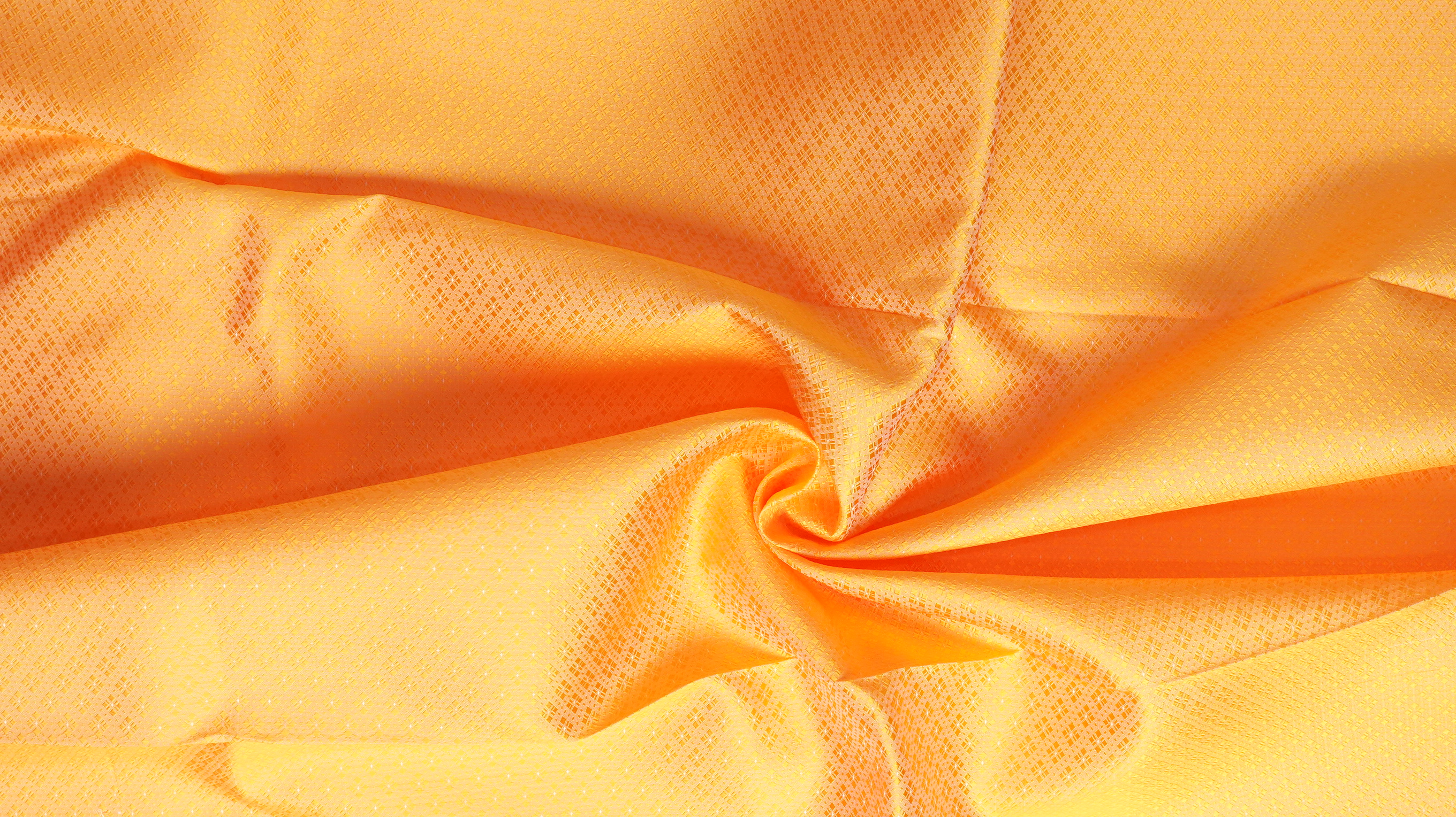 ผ้าไหมยกดอก ลายพิกุลล้อม สีพื้น ไหมแท้ สีส้มขมิ้น (ราคาต่อหลา) รหัส B1-NY-SKU-36557