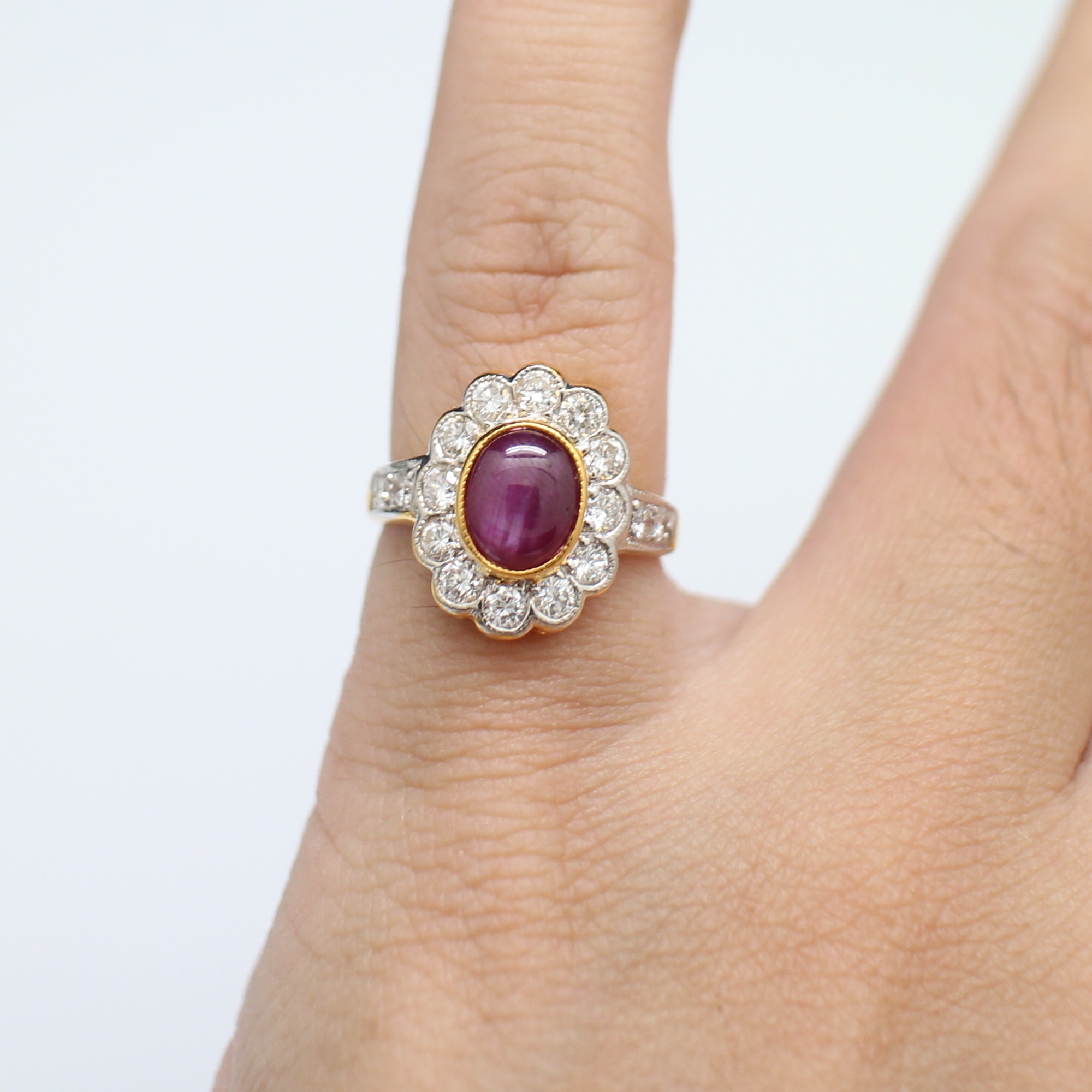 RG250095 แหวนทับทิมล้อมเพชร เพชรแท้ 16 เม็ด 0.70 กะรัต ทองแท้ 90% นน.รวม 4.4 กรัม ขนาดแหวน 48