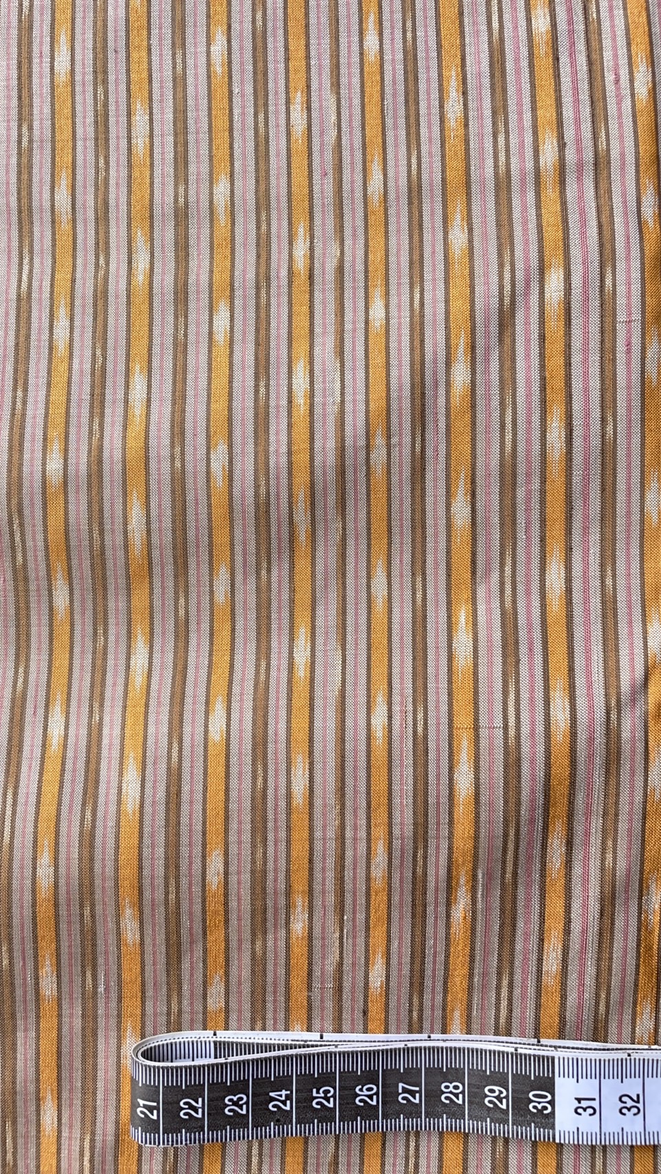 ผ้าไหมมัดหมี่ เนื้อไหมบ้าน ไหมแท้ สีธรรมชาติ ลายน้ำไหล สีน้ำตาลม่วงเทาอ่อน (ราคาต่อเมตร) รหัส CISP-NY-SKU-39318