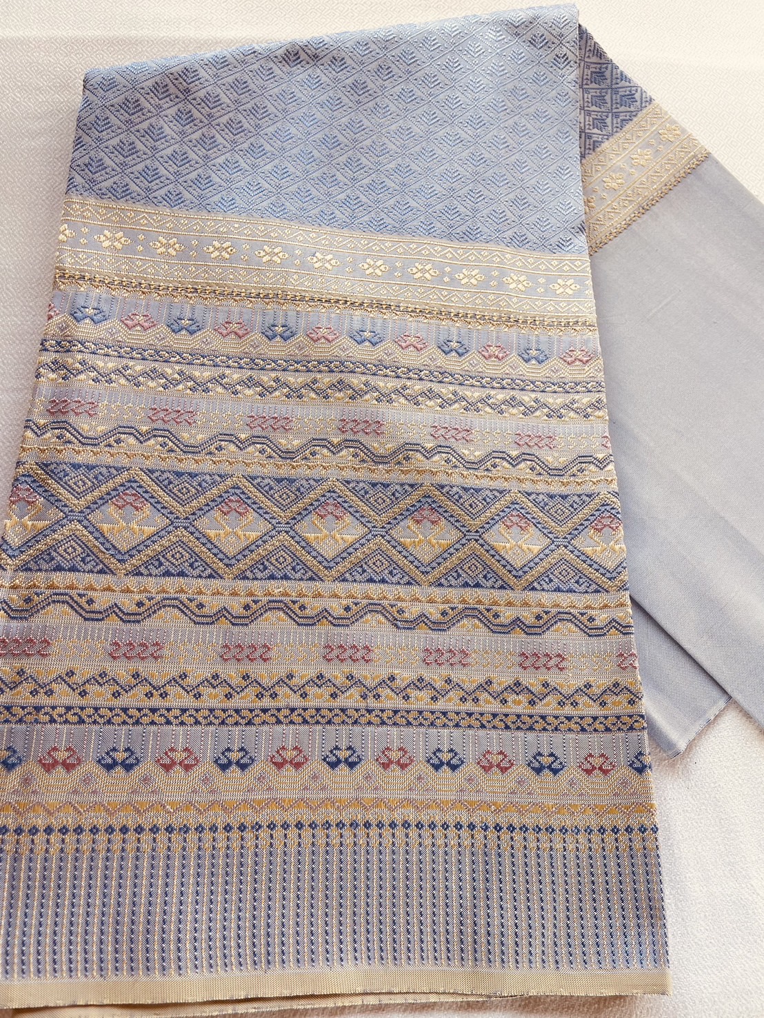 ซิ่นตีนจก ผ้าไหมทั้งผืน (ยืนไหม พุ่งไหม จกไหม) สีฟ้าครามอมเทาอ่อน รหัส N9-105-0809681