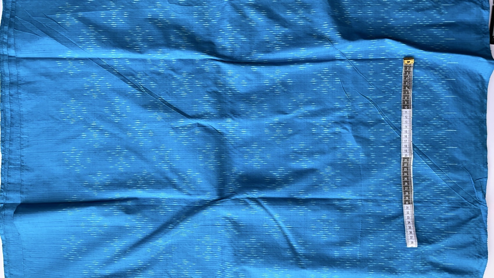 ผ้าไหมมัดหมี่ เนื้อไหมบ้าน ไหมแท้ ลายดอกแก้ว สีฟ้า ตัดขายเป็นเมตร รหัส CISP-NY-SKU-44173