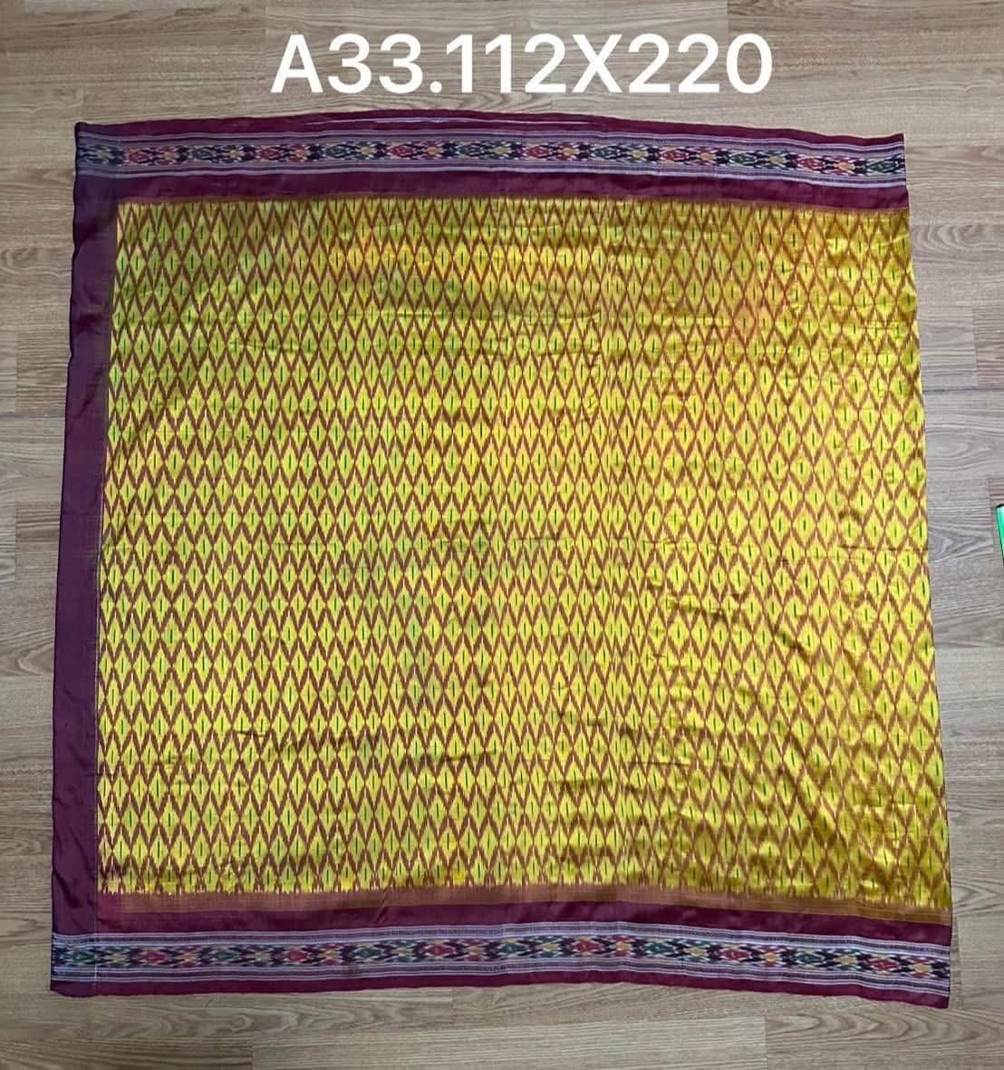 ซิ่น ไหมมัดหมี่ ผ้าปาโตล่า ขนาด 112x220ซม. พื้นสีเหลืองเชิงม่วง รหัส N9-SIL-0930682