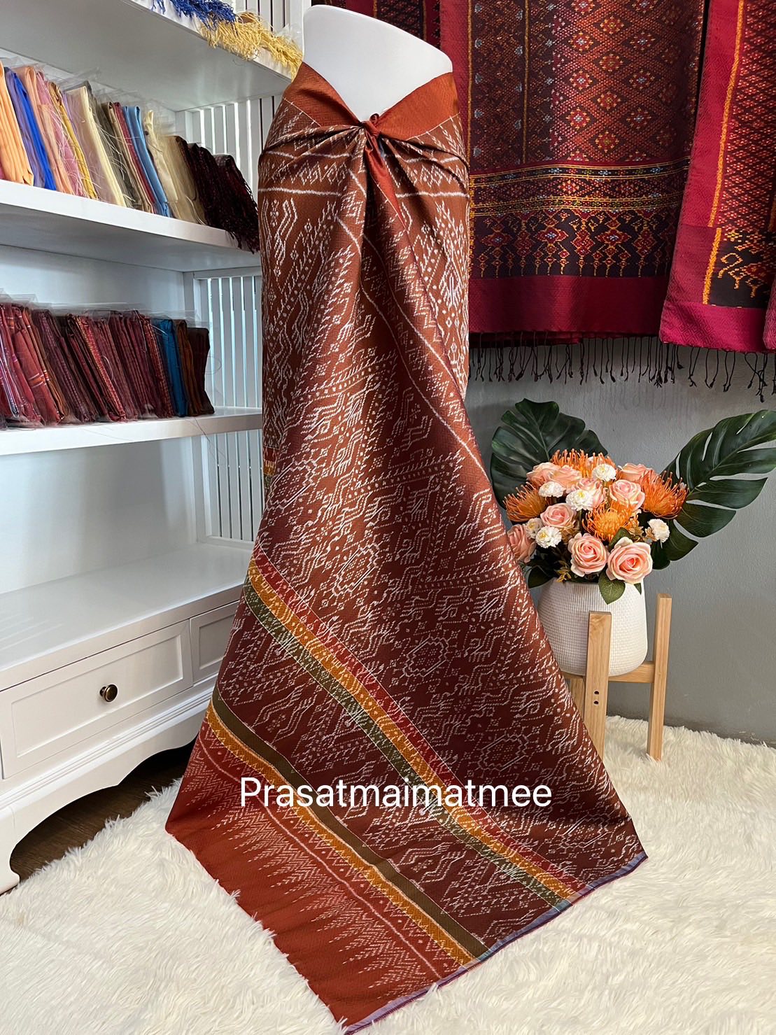 ซิ่น ผ้าไหมมัดหมี่ 5ตะกอ ขนาด 1x2เมตร ลายบันไดนาค พื้นสีน้ำตาลอมส้ม รหัส L9A-PS-05076857