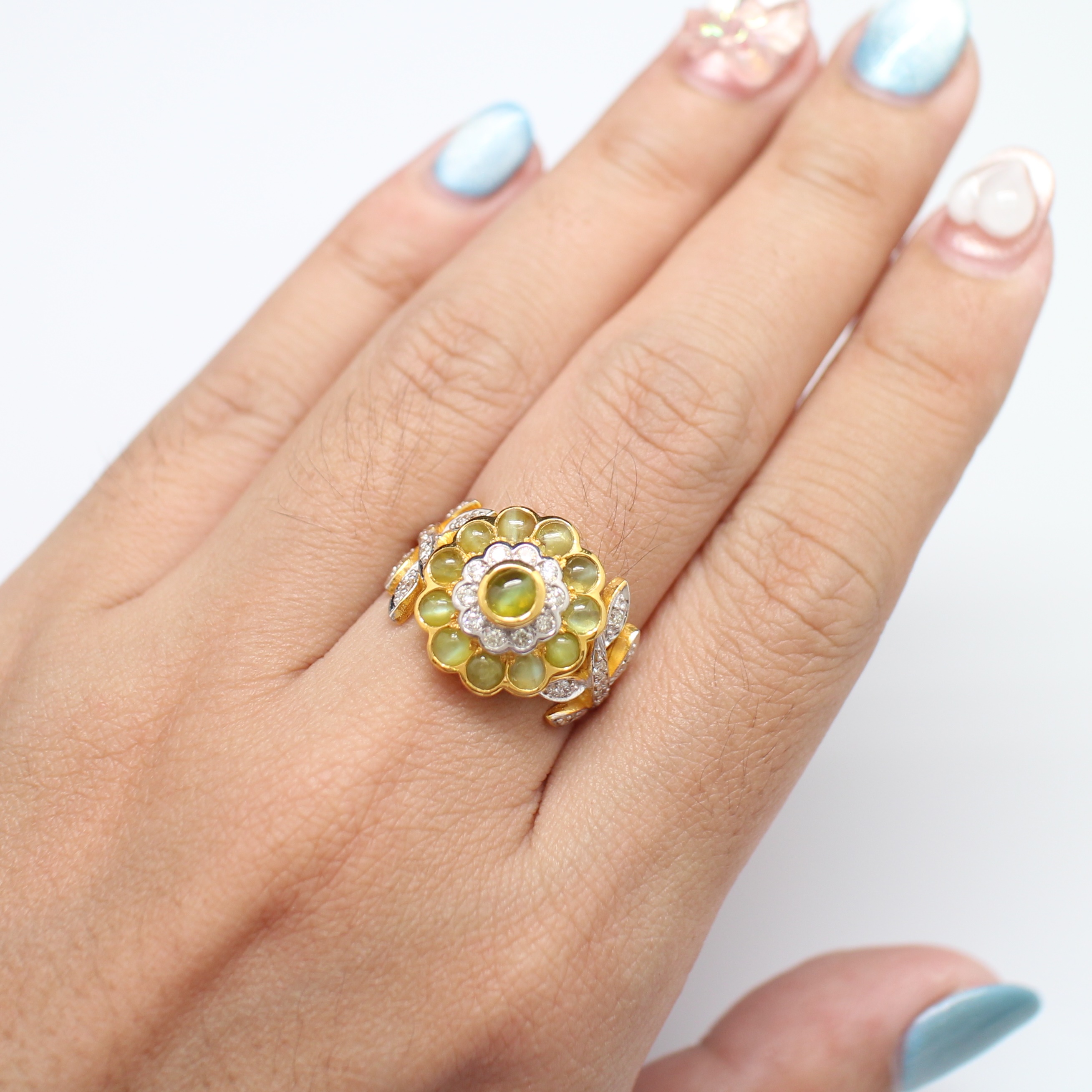 RG250102 แหวนตาแมวดอกไม้ ฝังเพชรแท้ 0.52 กะรัต ทองแท้ 9k นน.รวม 5.7 กรัม ขนาดแหวน 55