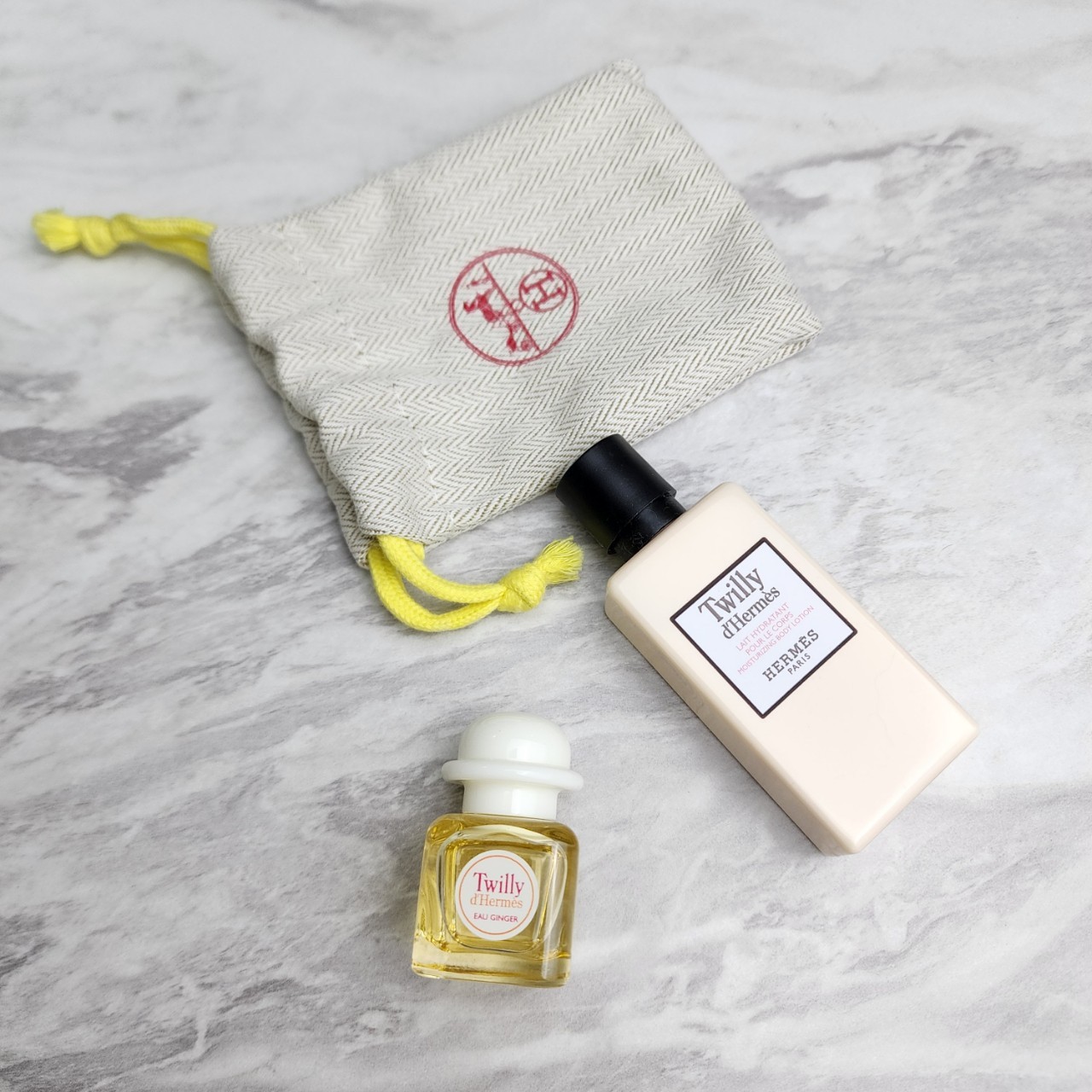 น้ำหอมจิ๋วมินิ Hermes Twilly d'Hermes Ginger EDP Set 7.5ml+Body Lotion 40ml (หัวแต้ม +ถุงผ้า )