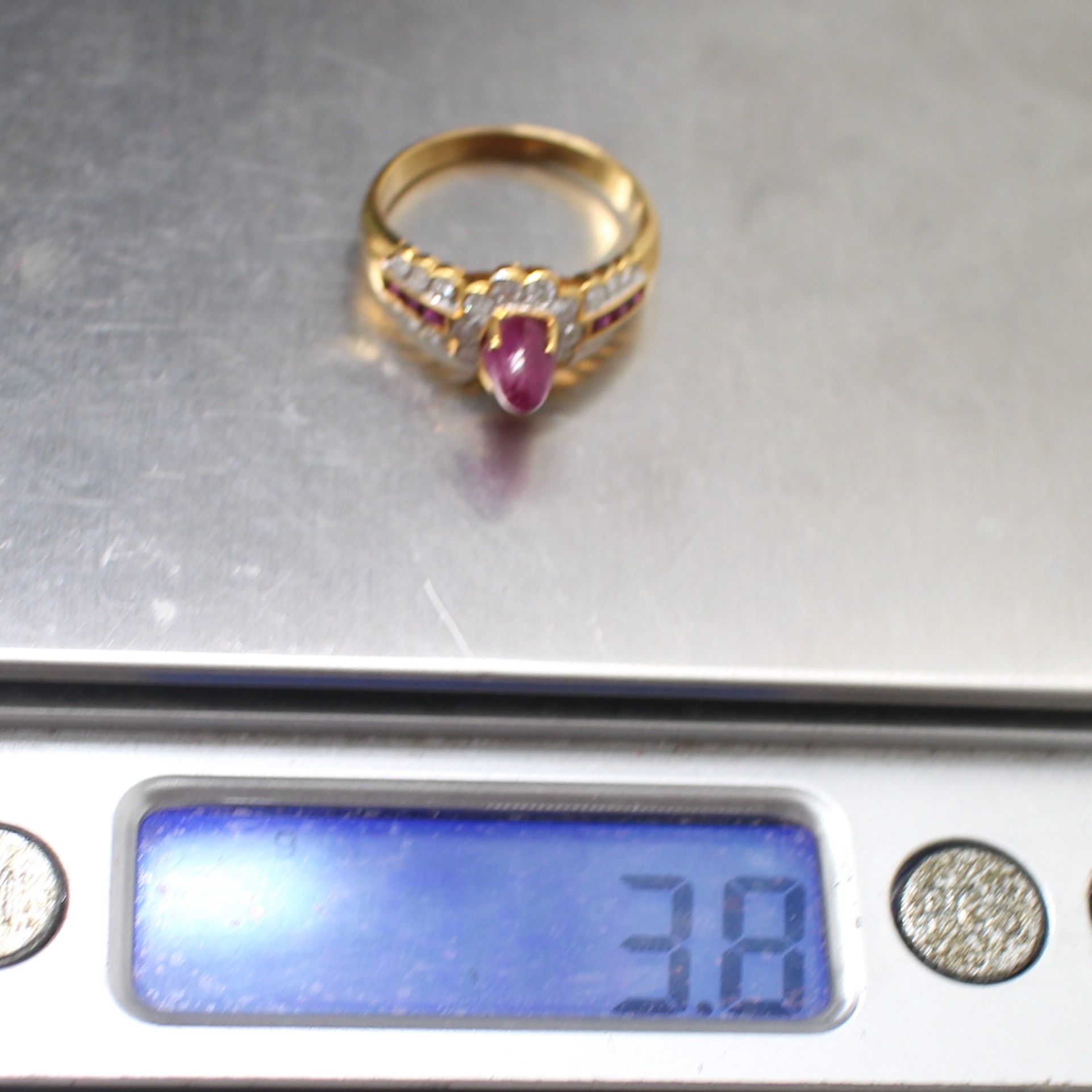 RG250201 แหวนทับทิมชูบ่าข้างเพชร เพชรแท้ 22 เม็ด 0.22 กะรัต ทองแท้ 90% นน.รวม 3.8 กรัม ขนาดแหวน 53