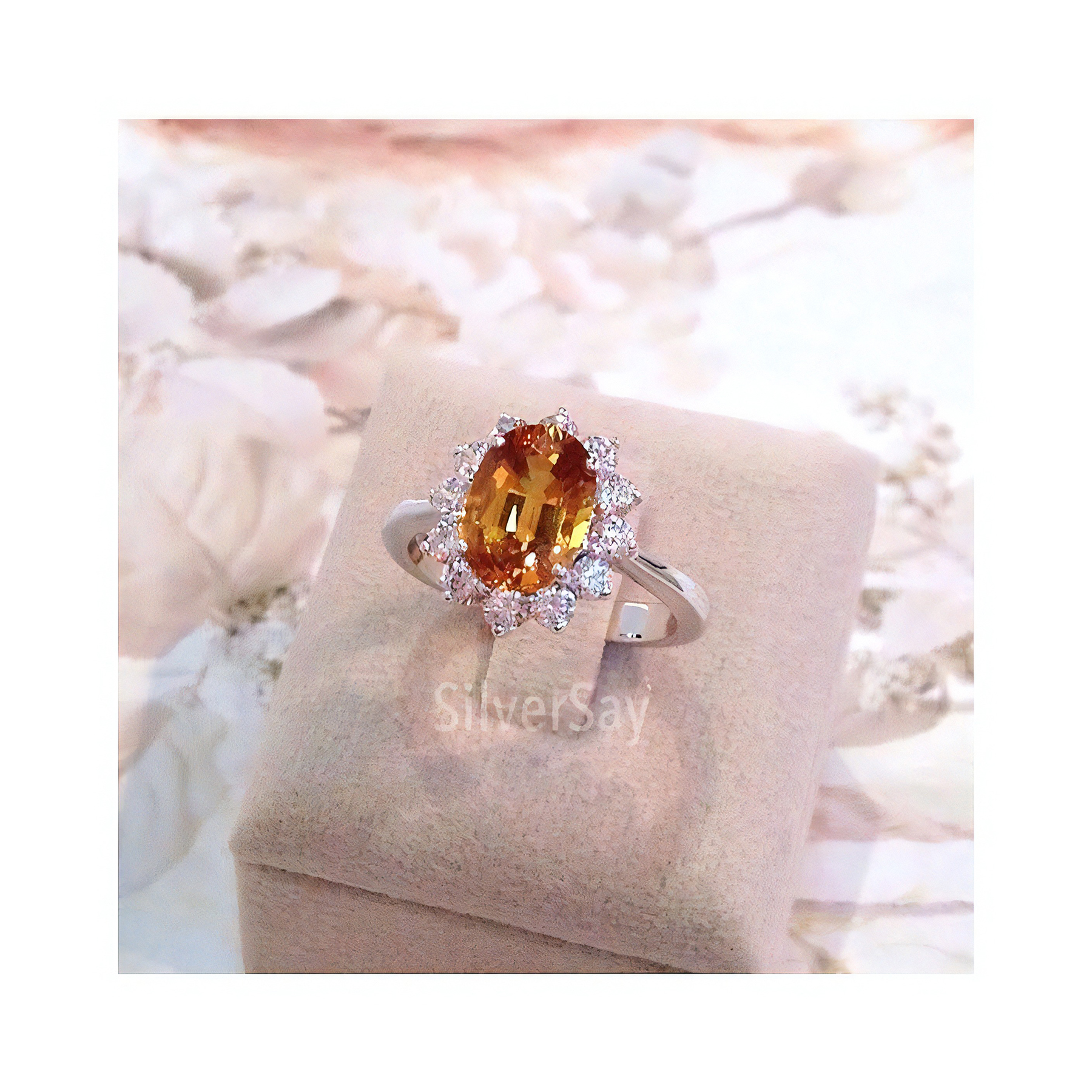 แหวนฝังพลอยซิทรินแท้ (Citrine)ล้อมเพชรสวิส เงินแท้ 925 ชุบทองคำขาว