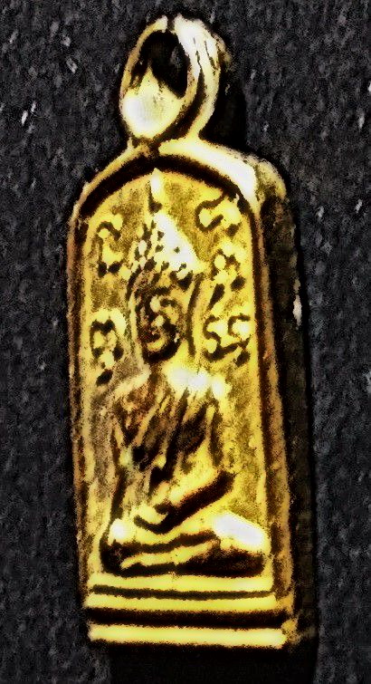 เหรียญใบมะขาม พิมพ์พระพุทธ หลัง นางกวัก หลวงปู่เหมือน วัดกำแพง จ.ชลบุรี ปี 2501