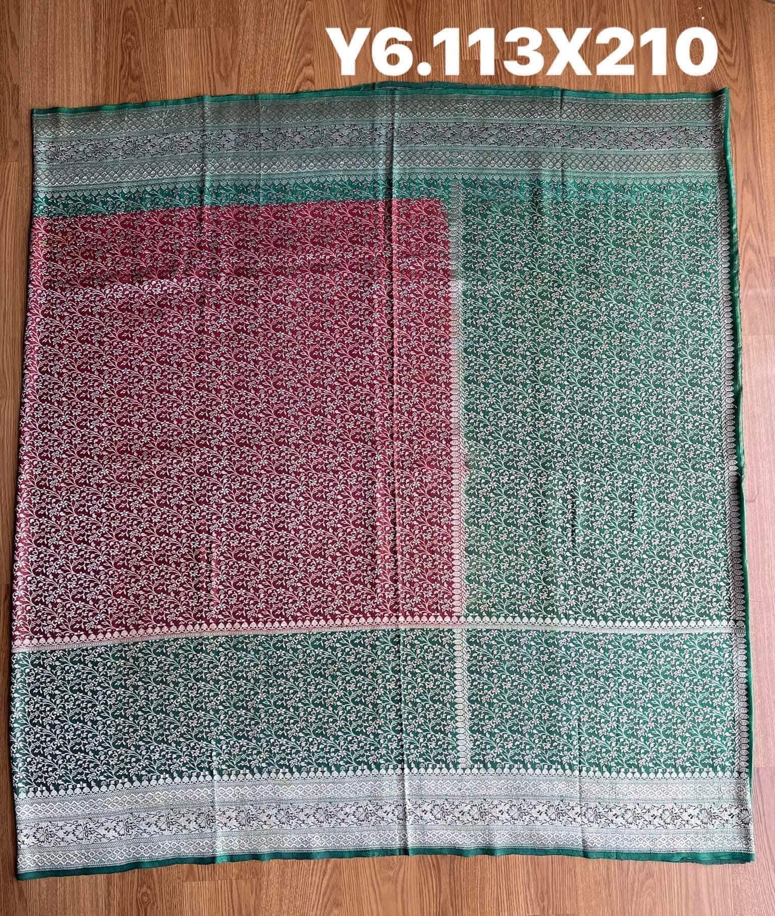 ซิ่น ผ้าปาโตล่ายกเงิน เส้นยืนไหมแท้ ขนาด 113x210ซม มีหน้านาง พื้นสีเขียว รหัส N9-SIL0522666