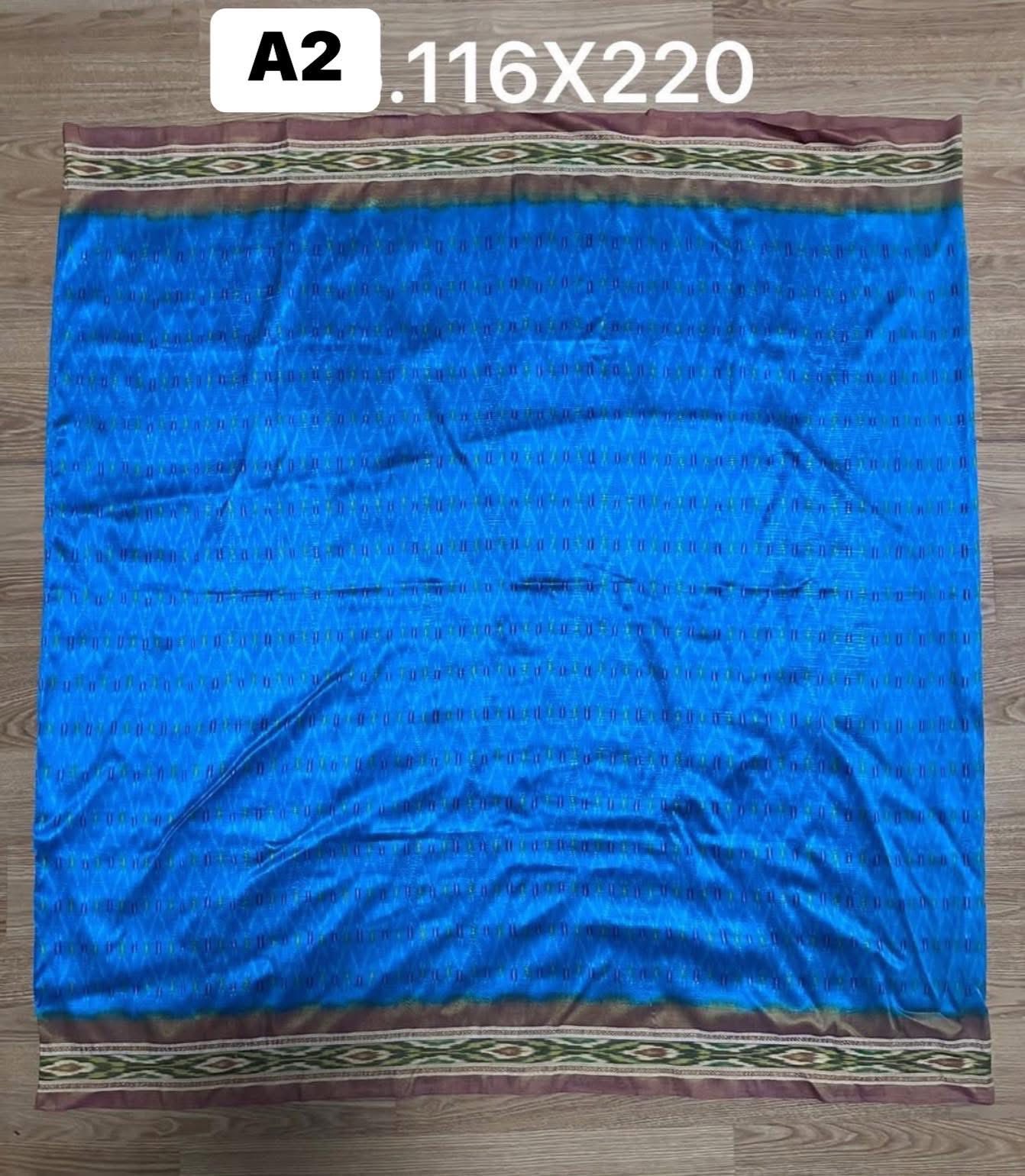 ซิ่น ไหมมัดหมี่ ผ้าปาโตล่า ขนาด 116x220ซม. พื้นสีฟ้าเชิงเหลือง รหัส N9-SIL-051768A2