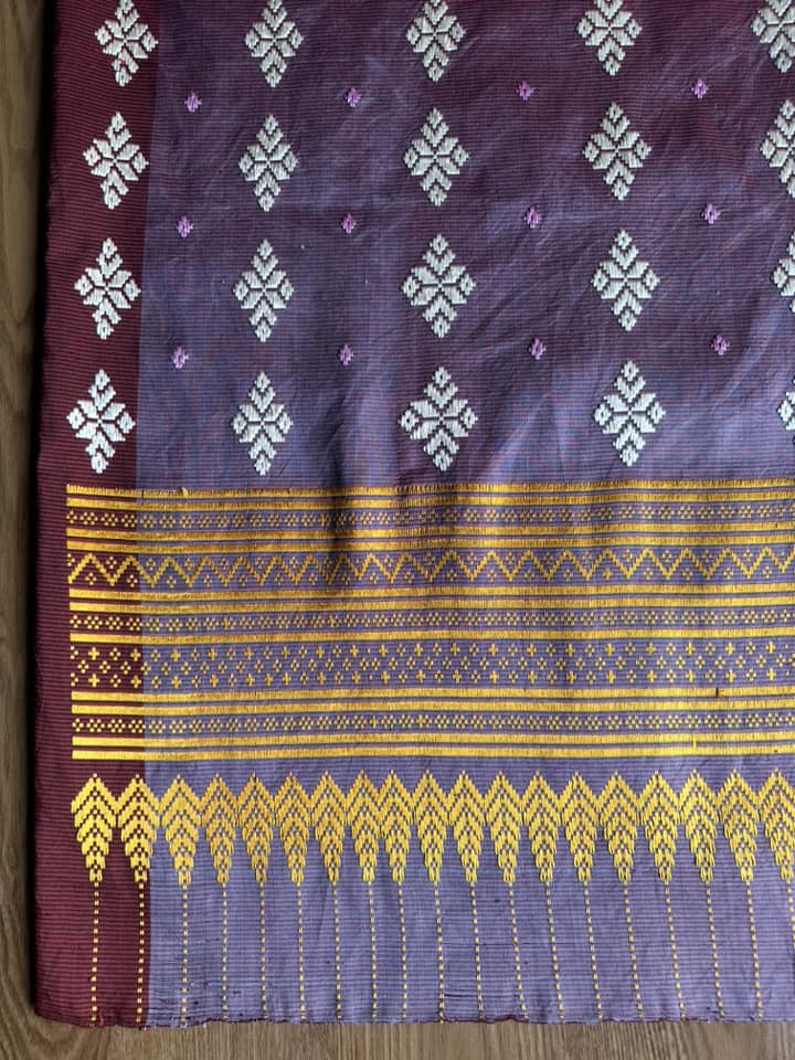 ซิ่น ผ้าซิ่นอัญญานาง ไหมบ้านทอมือ สีธรรมชาติ ขนาด 120x200ซม ลายบัวสวรรค์ พื้นสีม่วงเปลือกมังคุด รหัส N9-SIL0531661